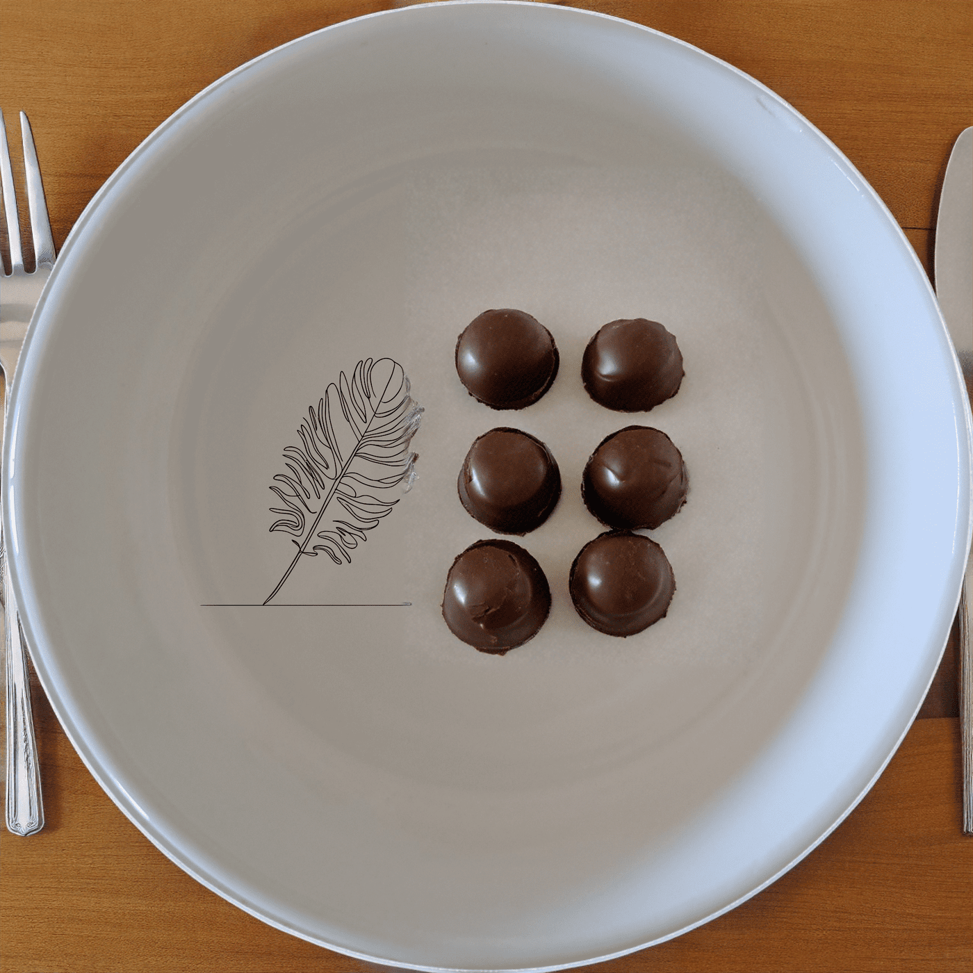 The Ostrich Feather Delicate Bowl Set of 4 features a subtle, elegant design perfect for any dining occasion.