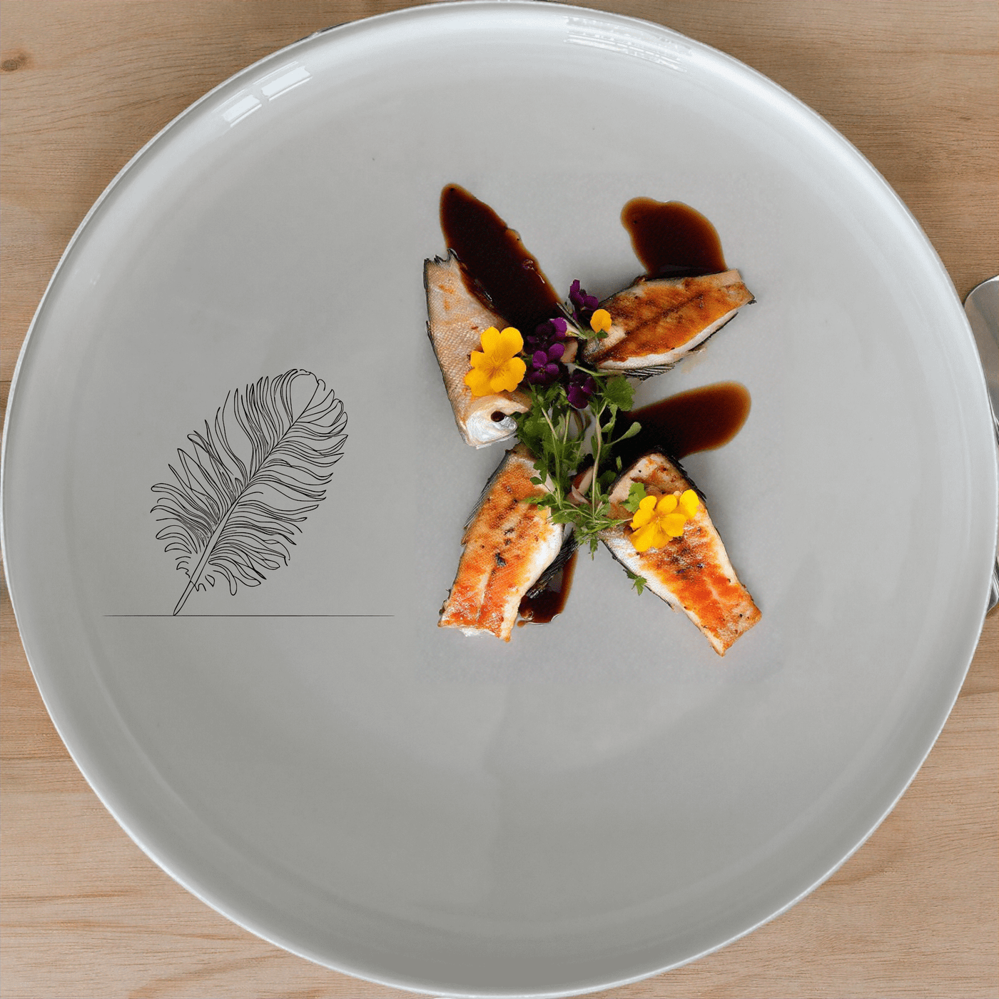 The Ostrich Feather Dinner Plate Set of 4 adds a touch of nature to your dining table with its delicate, detailed design.