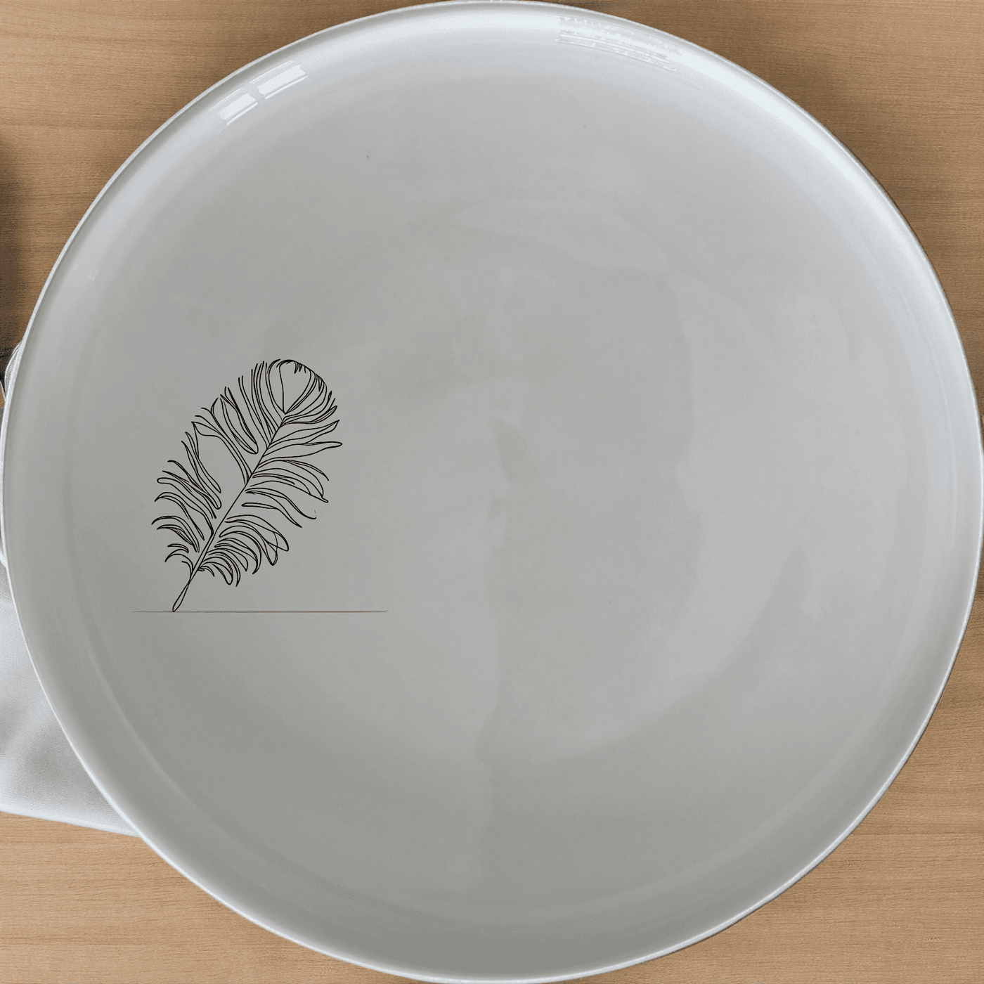 The Ostrich Feather Delicate Side Plate Set of 4 adds a touch of sophistication to any dining table with its intricate design and timeless appeal.
