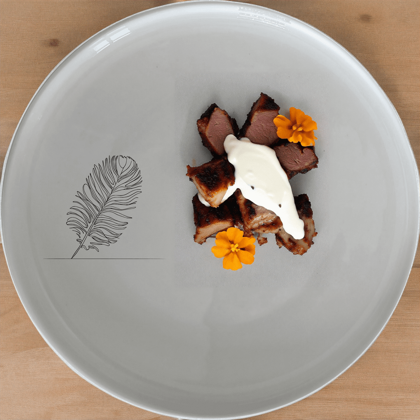 The Ostrich Feather Side Plate Set of 4 adds a touch of sophistication to your dining table with its delicate, detailed design.