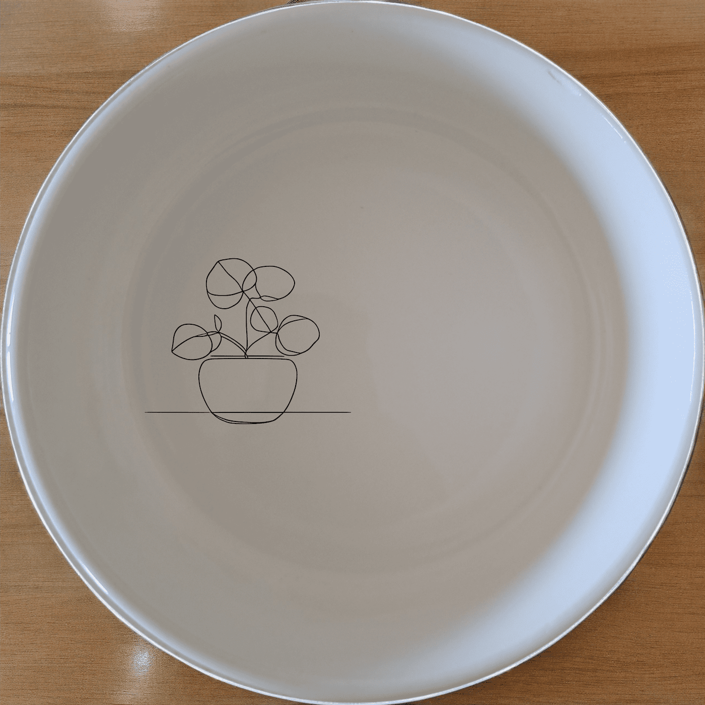 The Pilea Peperomioides Bowl Set of 4 is a stylish and versatile addition to your kitchen, perfect for serving snacks or desserts.