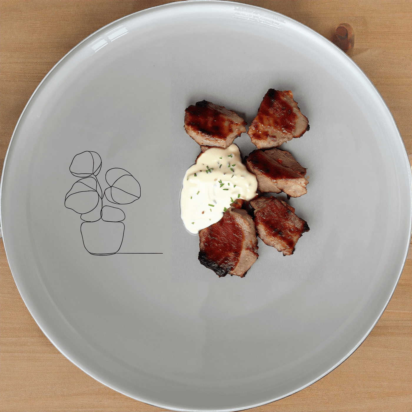 The Pilea Plant Dinner Plate Set of 4 features a minimalist design perfect for modern dining spaces.