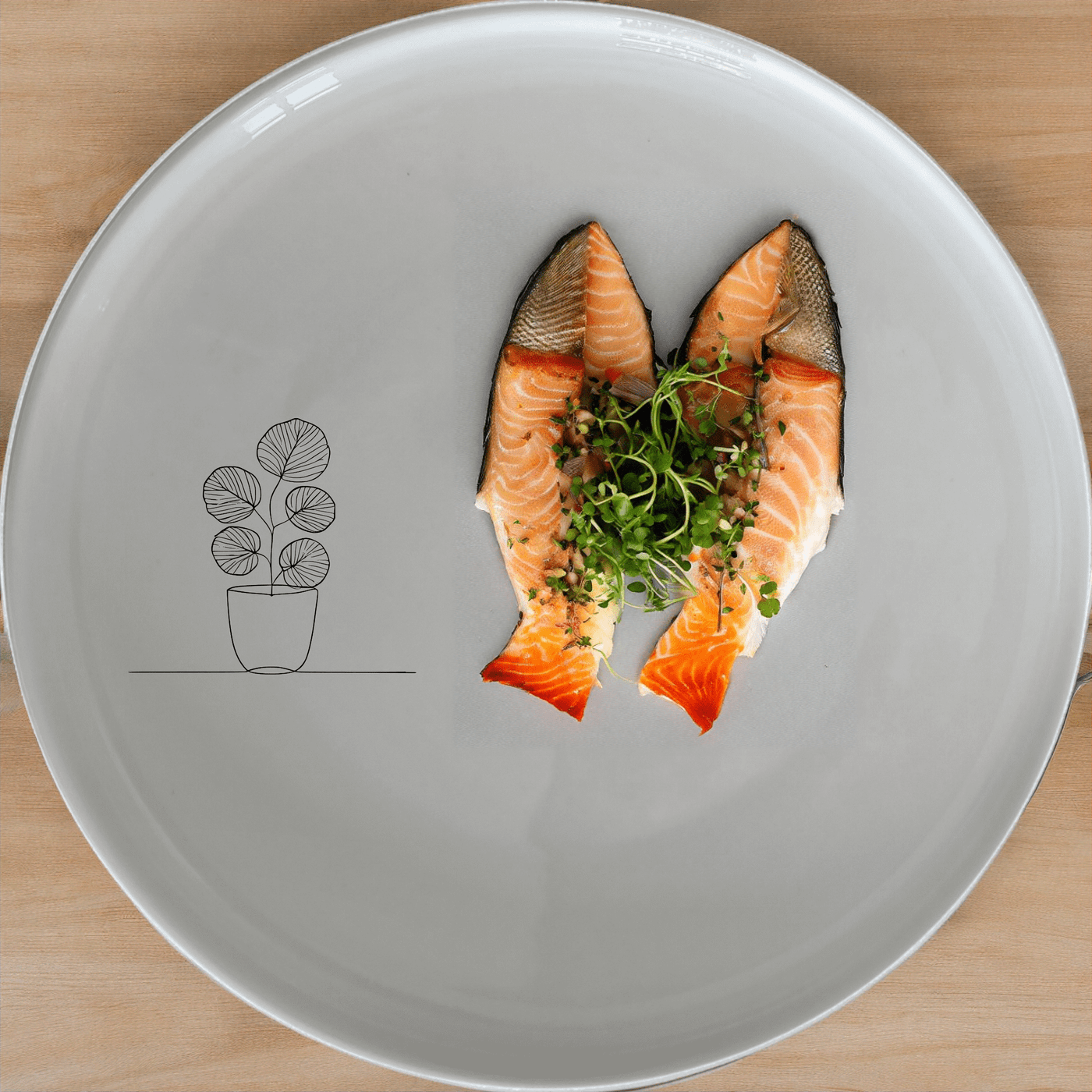 The Pilea Peperomioides Side Plate Set of 4 adds a touch of modern elegance to your dining table with its sleek design and minimalist aesthetic.