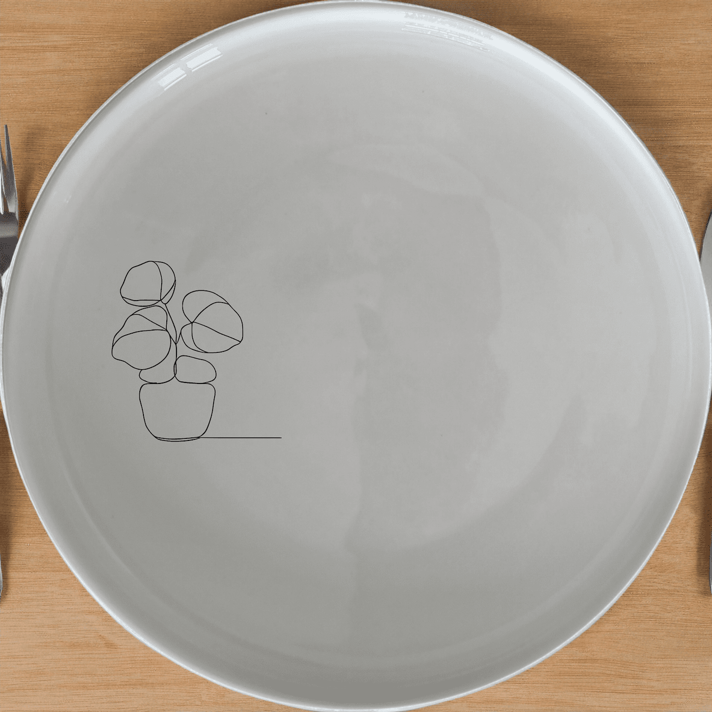 The Pilea Plant Side Plate Set of 4 adds a modern touch to your dining table with its minimalist design and elegant plant motif.