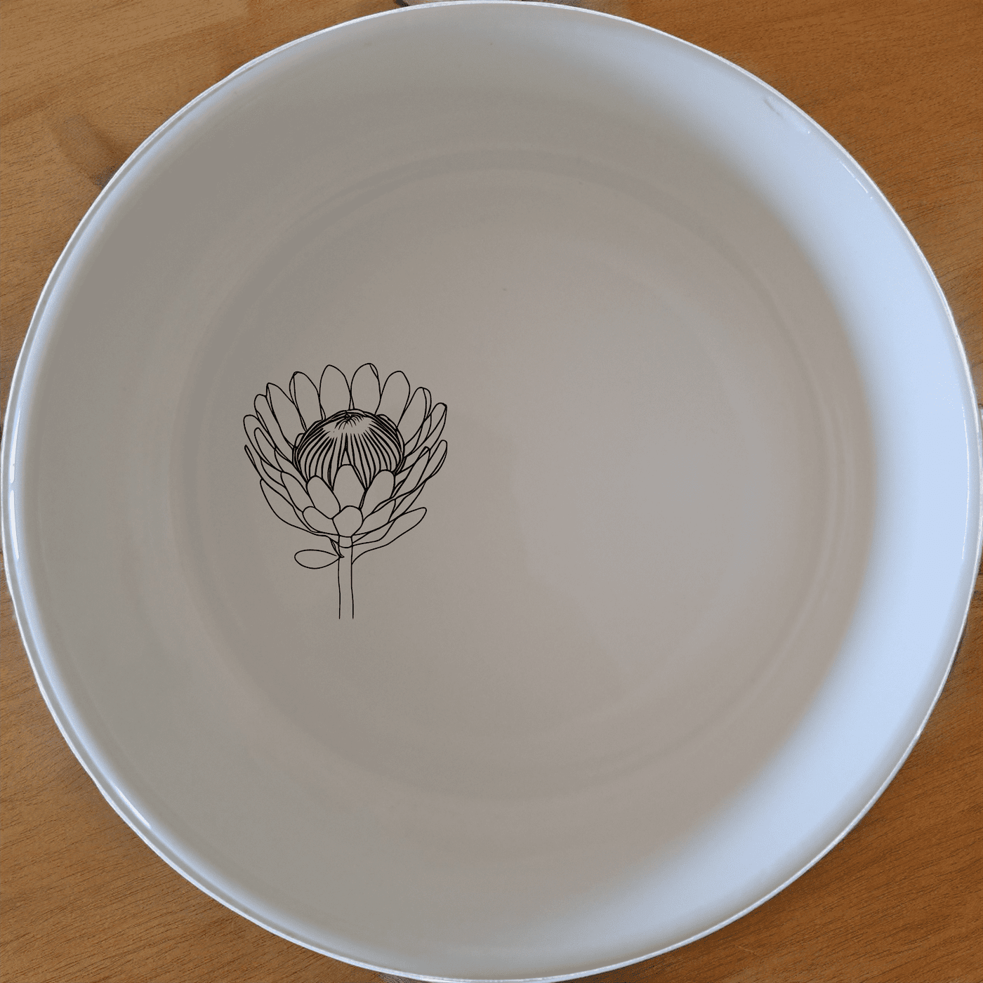 The Pincushion Protea Flower Bowl Set of 4 adds a touch of nature to your dining table with its elegant design and versatile use.