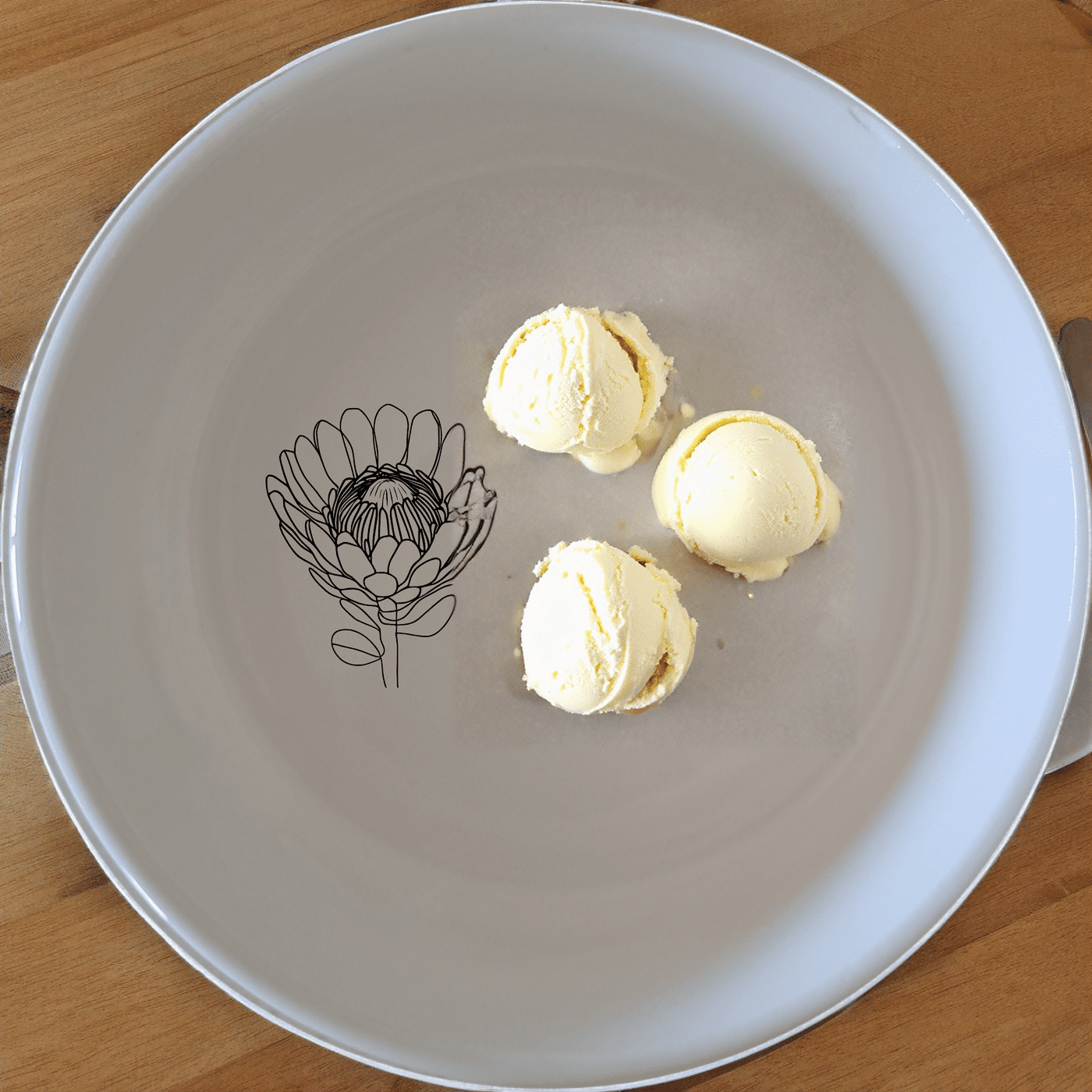 The Pincushion Protea Flower Bowl Set of 4 features delicate botanical designs perfect for everyday use or special occasions.