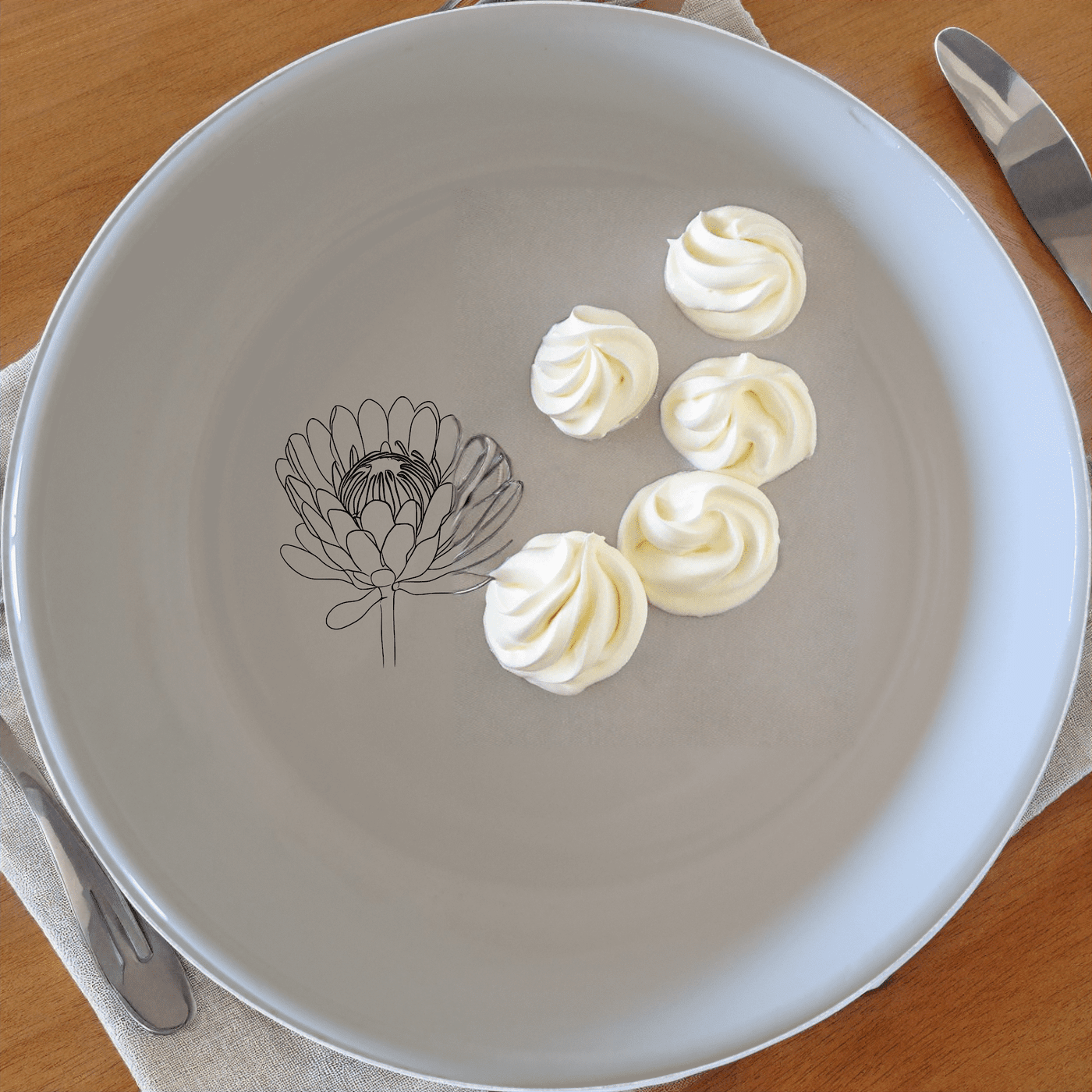 The Pincushion Protea Flower Bowl Set of 4 adds a touch of nature to your dining table with its elegant design.