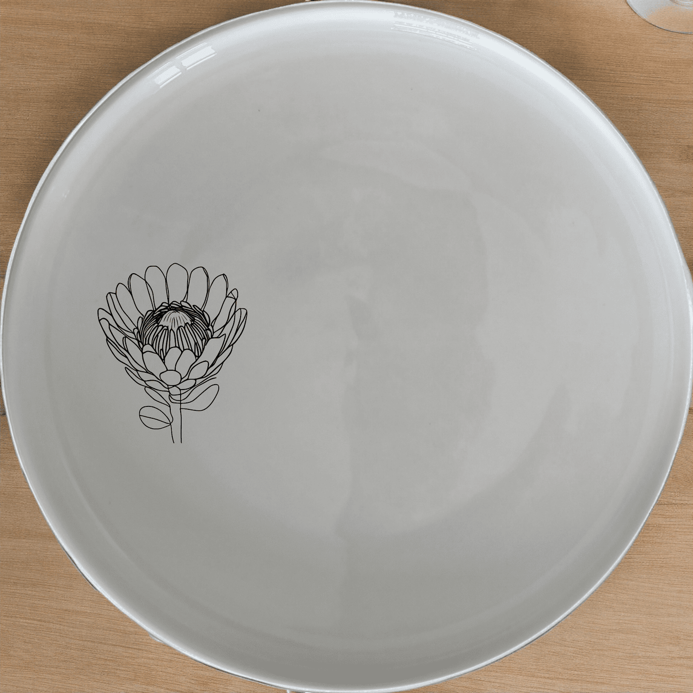 The Pincushion Protea Flower Dinner Plate Set of 4 features elegant botanical designs perfect for any dining occasion.