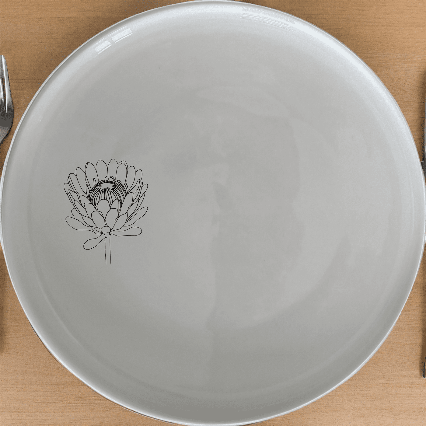 The Pincushion Protea Flower Dinner Plate Set of 4 features a delicate botanical design, perfect for elevating any dining experience.