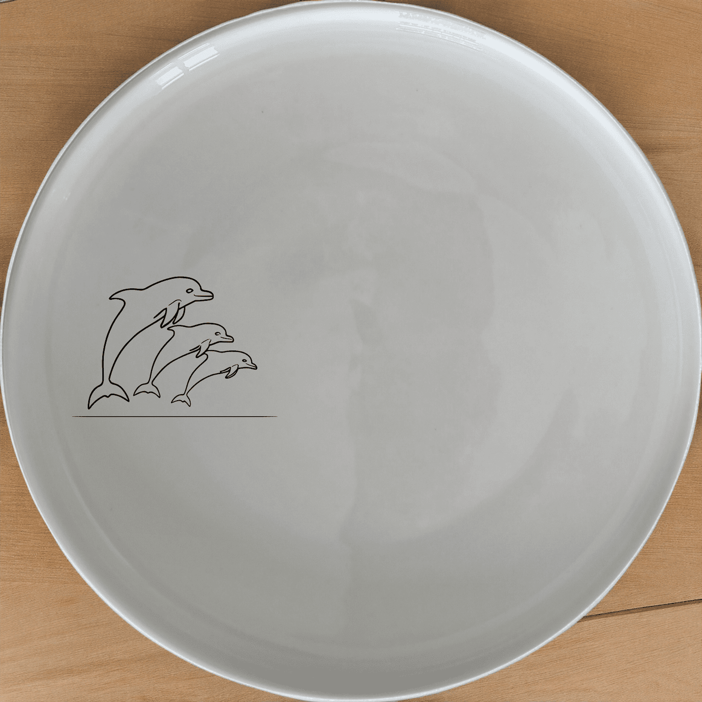 Pod Jumping Dolphins Dinner Plate Set of 4 - Range 2 is a stylish and elegant dinner plate set featuring a beautiful dolphin design.