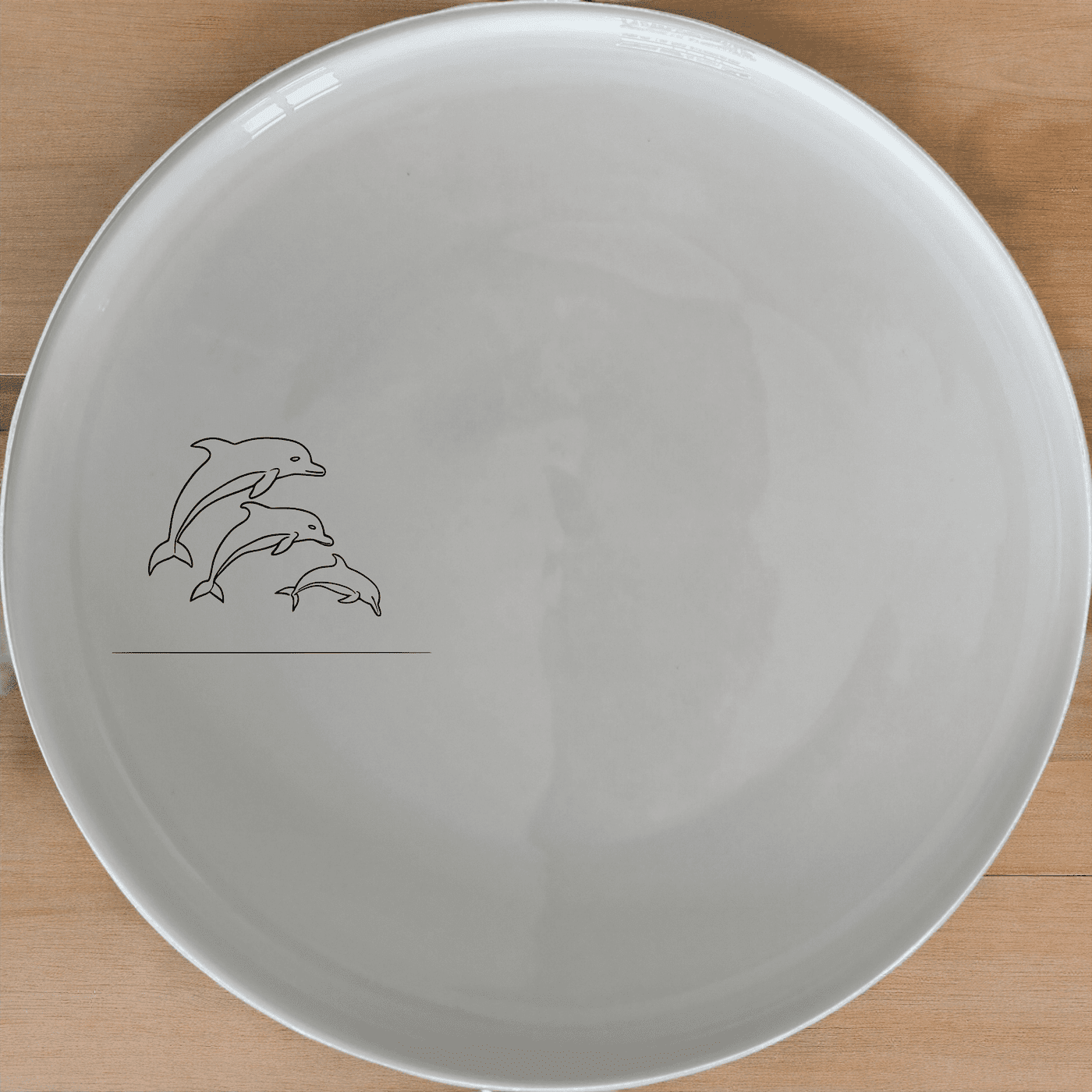 Discover the Jumping Dolphins Side Plate Set of 4 - Range 1, a captivating collection of ceramic plates featuring elegant dolphin artwork.