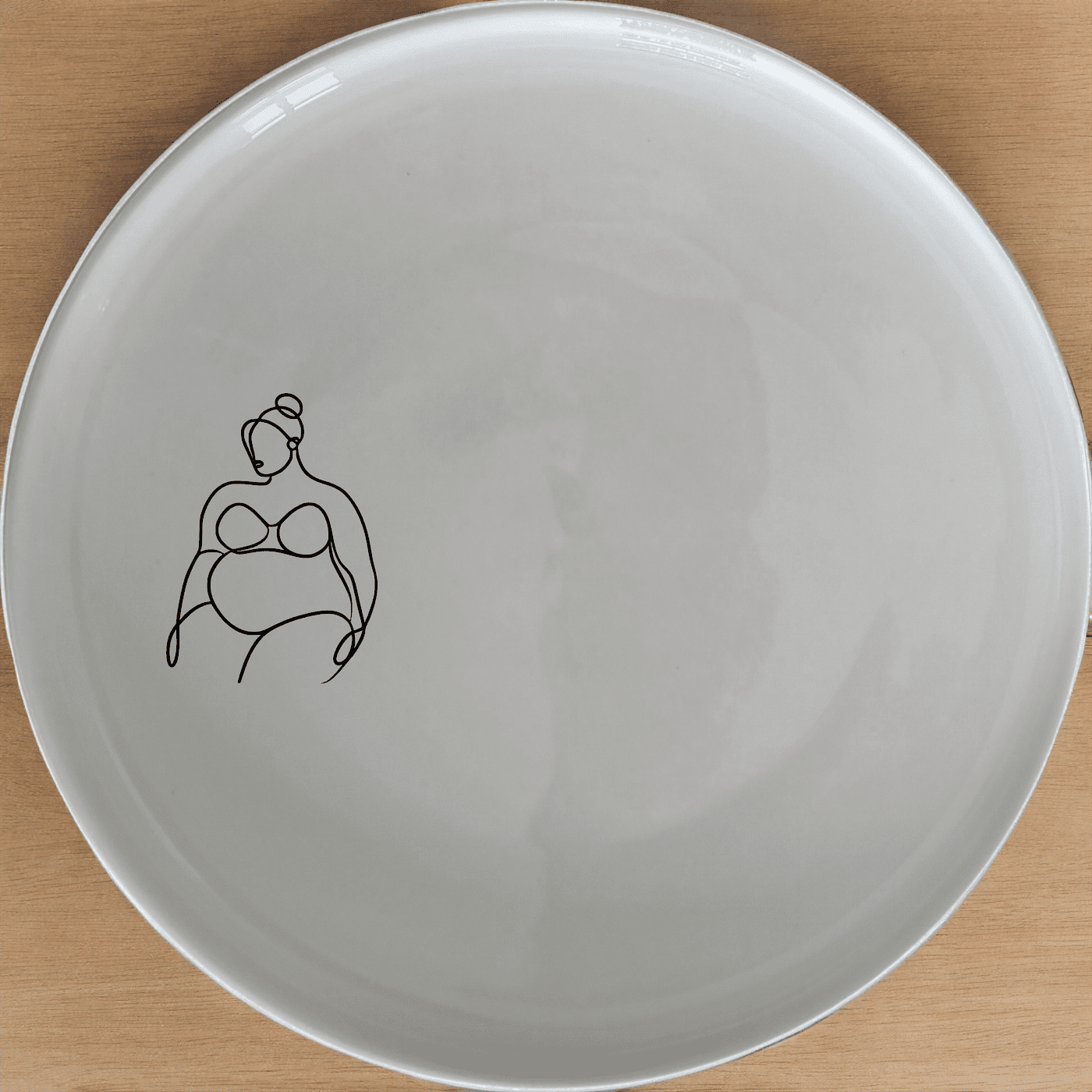 Fat Curvey Ladies Dinner Plate Set of 4 - Range 4 is a stylish and modern dinner plate set featuring an abstract silhouette design, perfect for contemporary dining.