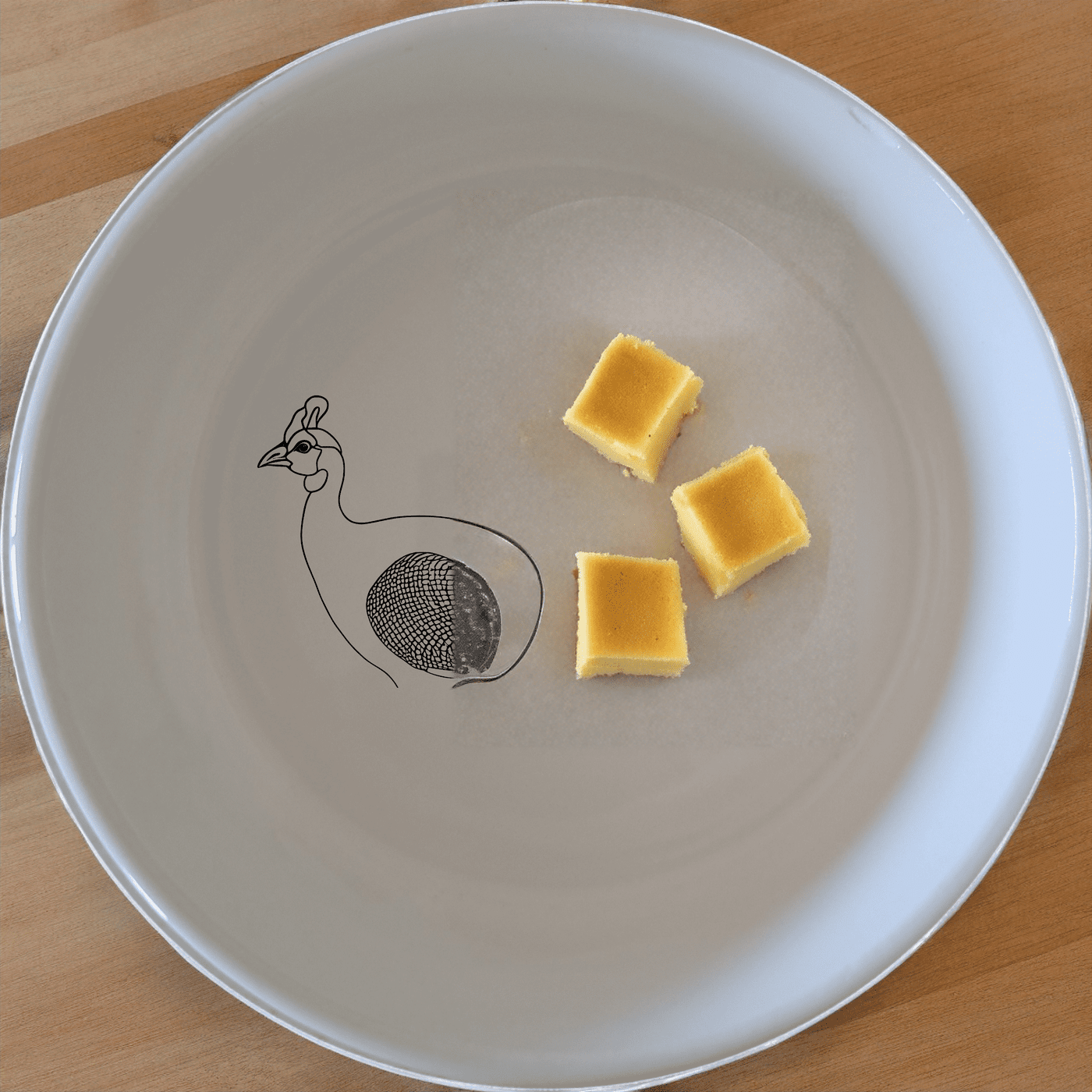 The South African Helmeted Guineafowl Bowl Set of 4 features elegant ceramic bowls with a distinctive bird design, perfect for any dining occasion.