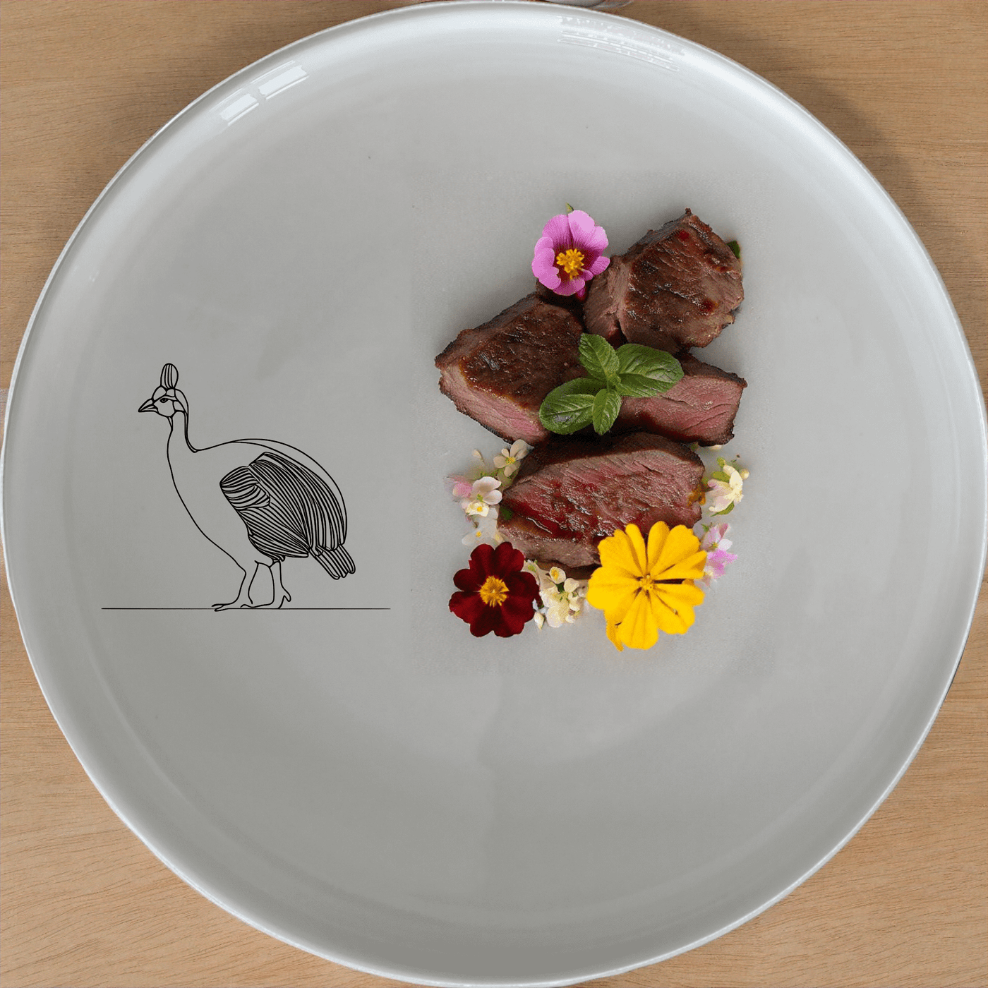 South African Helmeted Guineafowl Dinner Plate Set of 4 is a stylish and unique dinner plate set featuring an elegant guineafowl design.