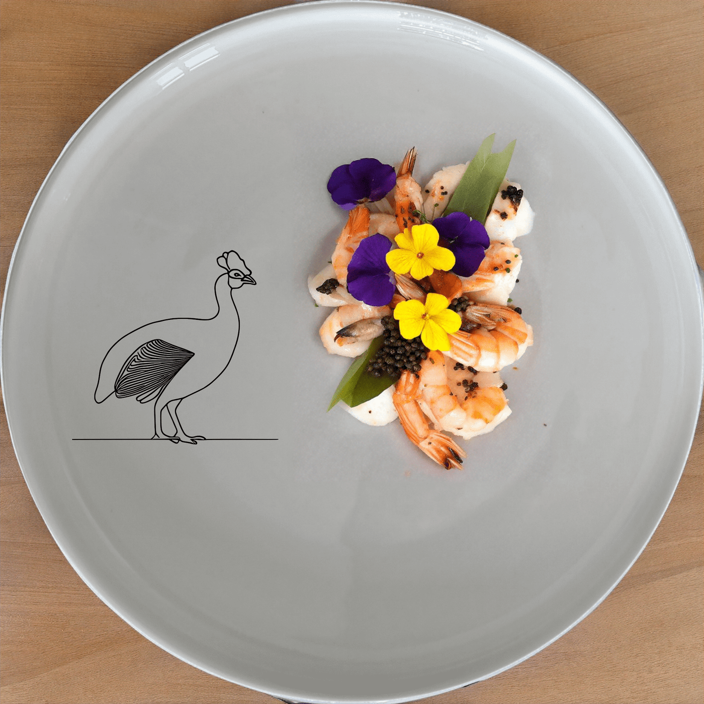 The South African Helmeted Guineafowl Dinner Plate Set of 4 features a striking silhouette design, perfect for adding a touch of nature to your dining experience.