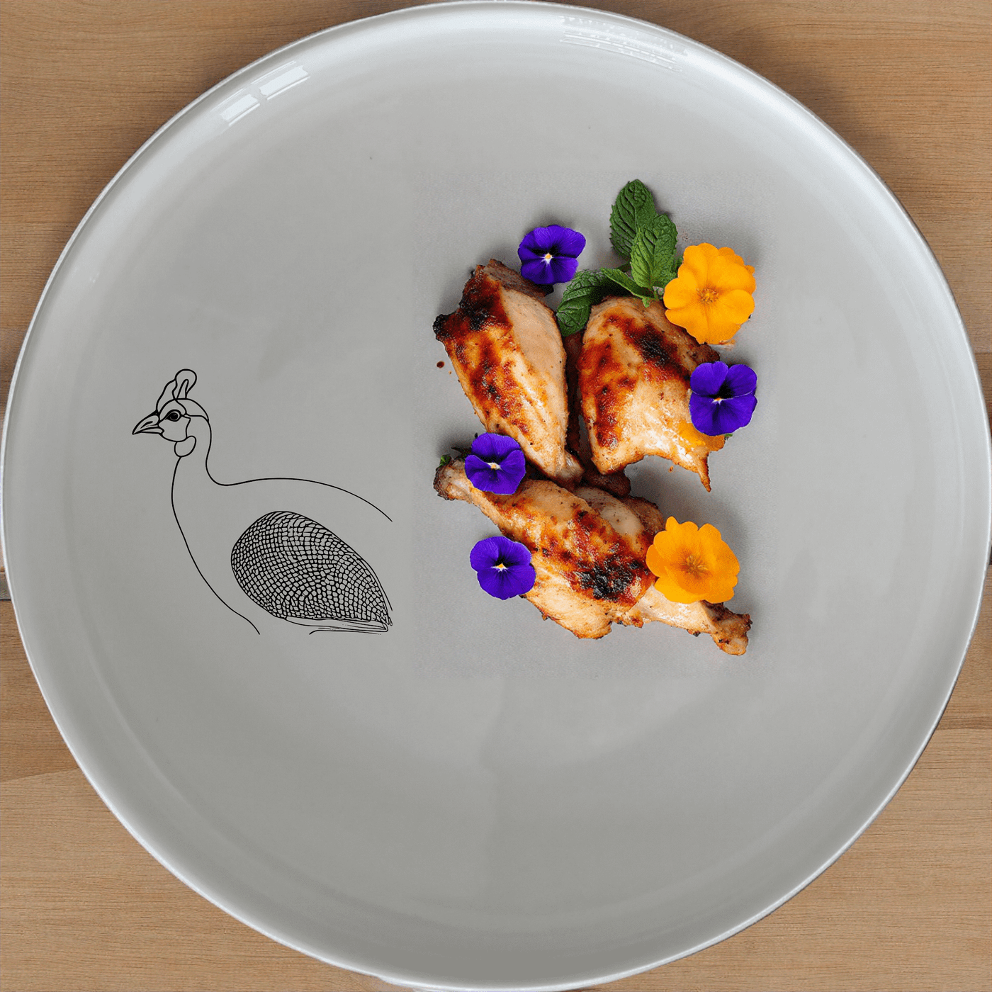 The Helmeted Guineafowl Dinner Plate Set of 4 features elegant laser-etched designs perfect for any dining occasion.