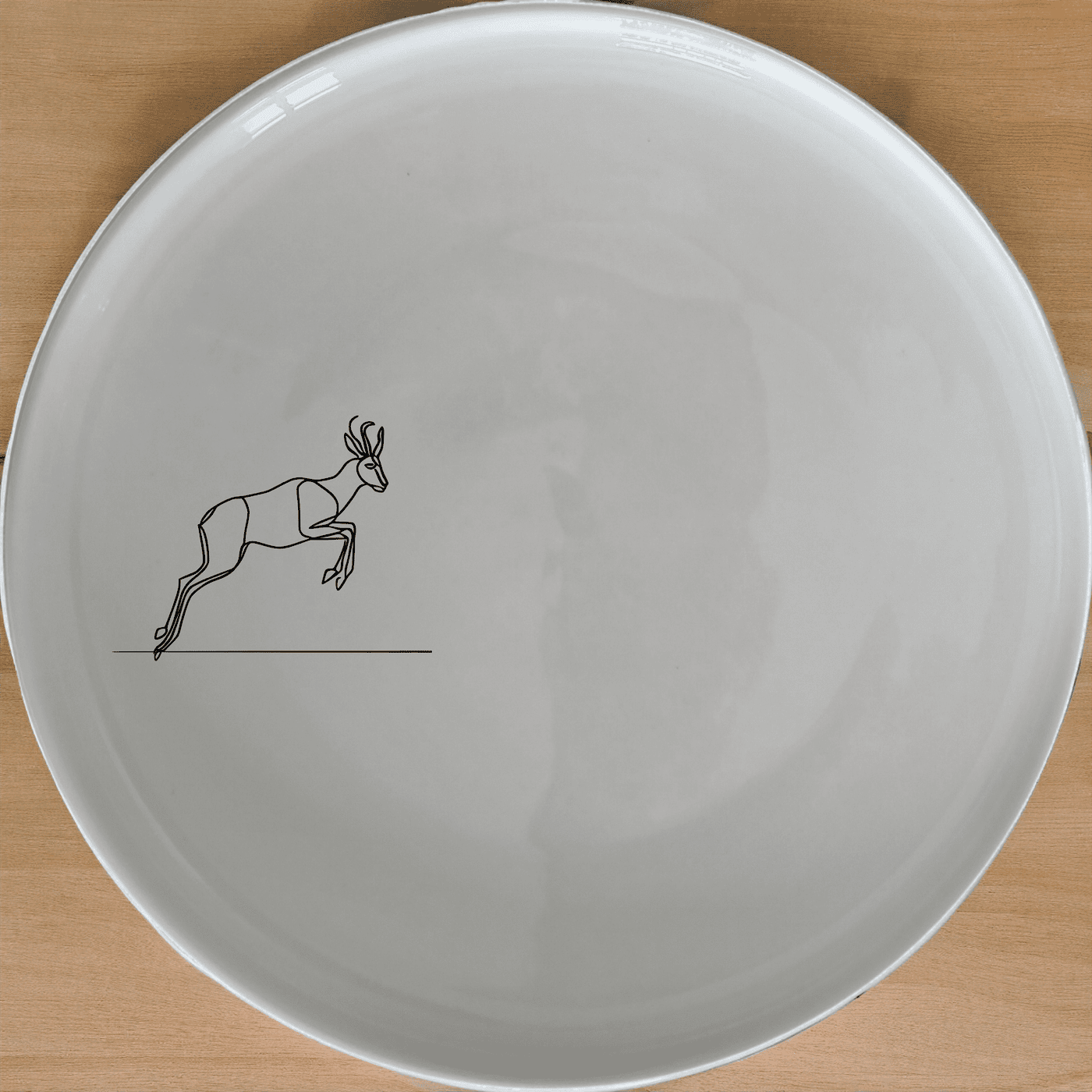 The Springbok Leaping Graceful Silhouette Side Plate Set of 4 adds a touch of nature to your dining table with its sleek design.