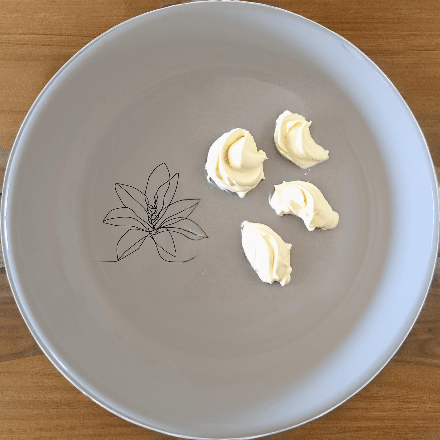 The Stromanthe Triostar Bowl Set of 4 features a minimalist design with a subtle abstract pattern, perfect for modern and contemporary dining settings.