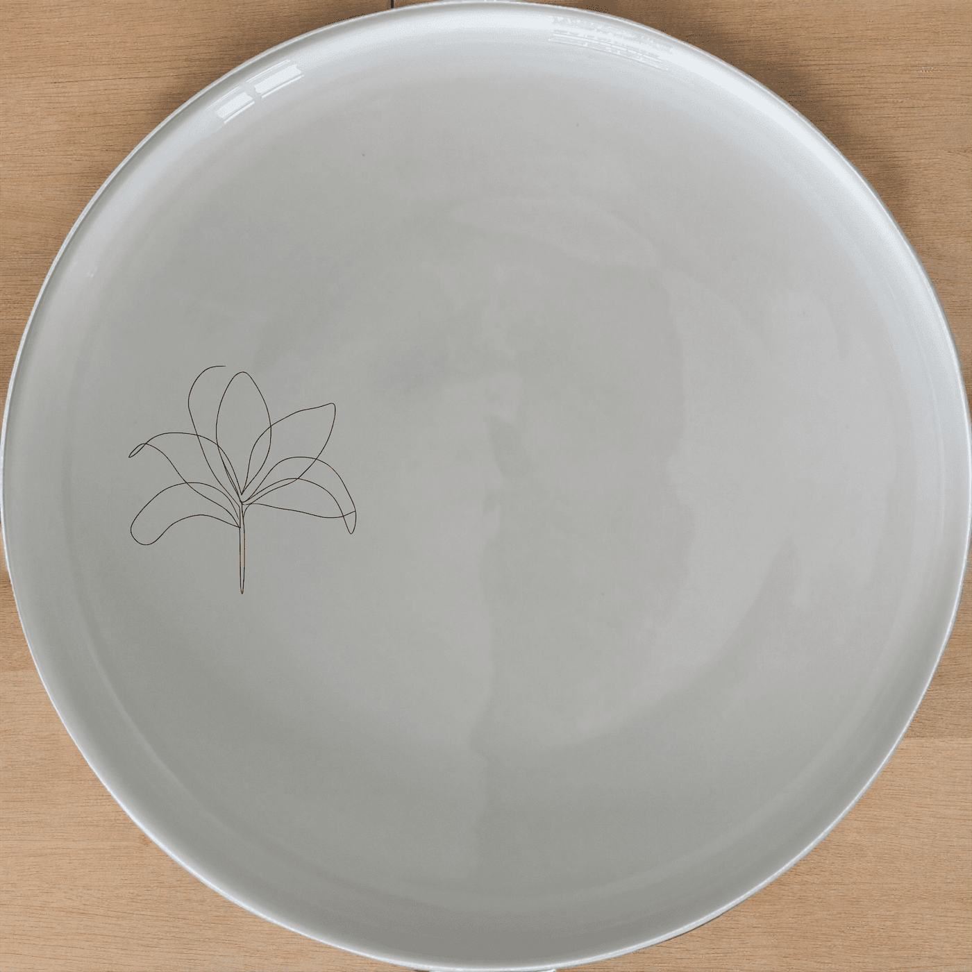 The Stromanthe Triostar Dinner Plate Set of 4 features a sleek, modern design perfect for any dining occasion. Crafted from durable ceramic, these plates are both stylish and functional, making them an ideal addition to your dinnerware collection.
