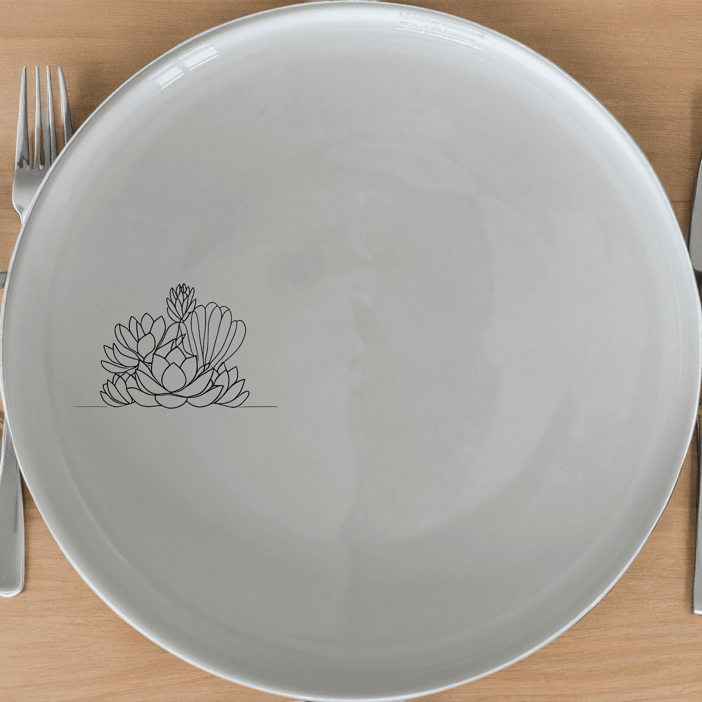 The Succulent Garden Dinner Plate Set of 4 adds a touch of nature to your dining experience with its elegant design and durable ceramic construction.