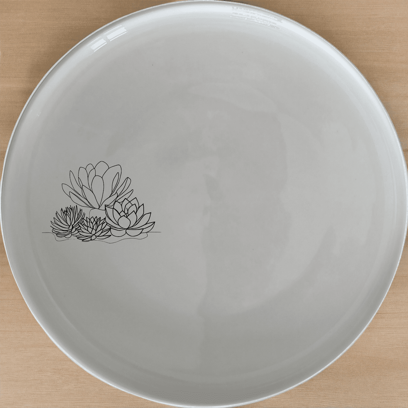 The Succulent Garden Dinner Plate Set of 4 features elegant, minimalist designs perfect for any dining occasion.