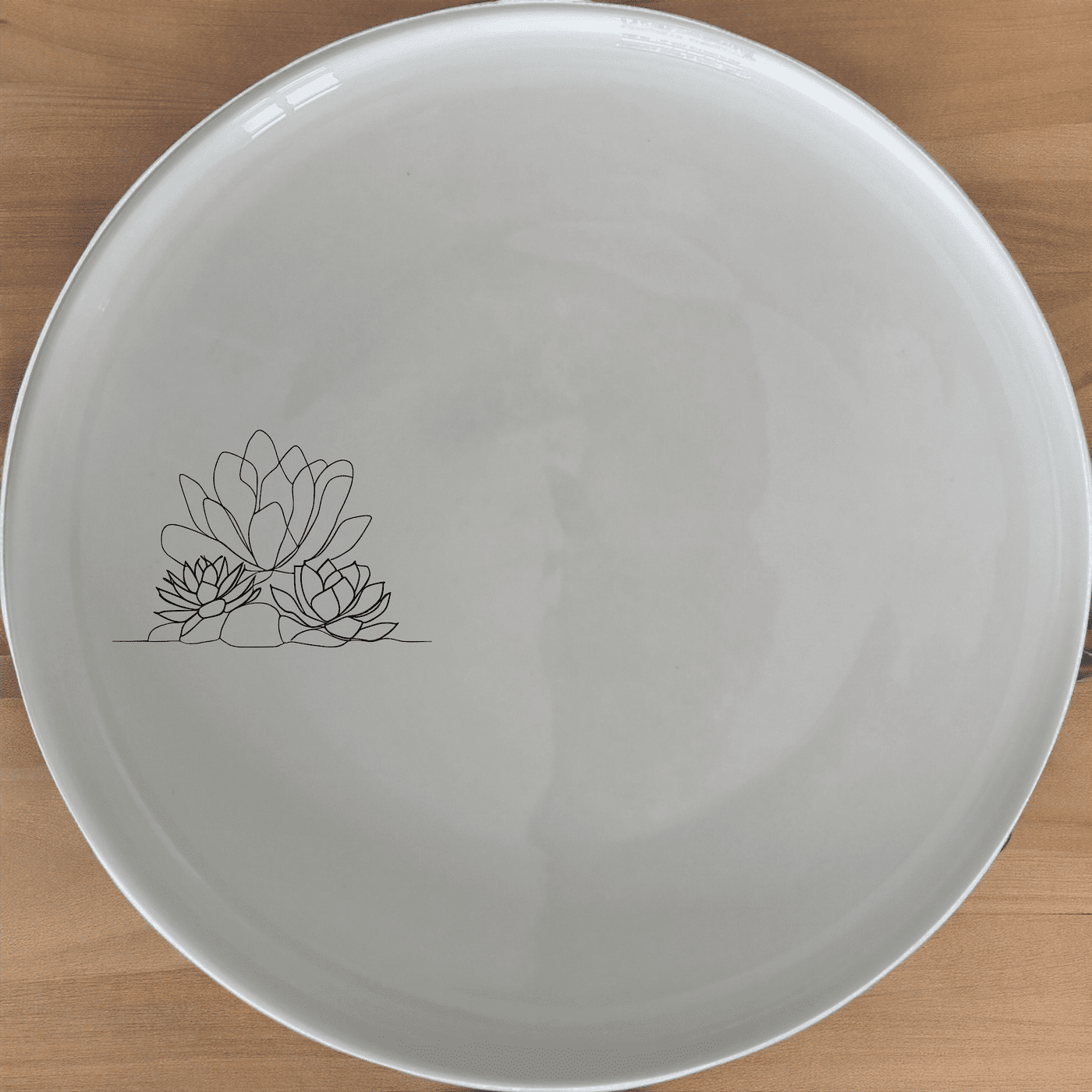 Succulent Garden Dinner Plate Set of 4 offers a modern, minimalist design perfect for any dining table. Crafted from durable ceramic, these plates are both stylish and practical.