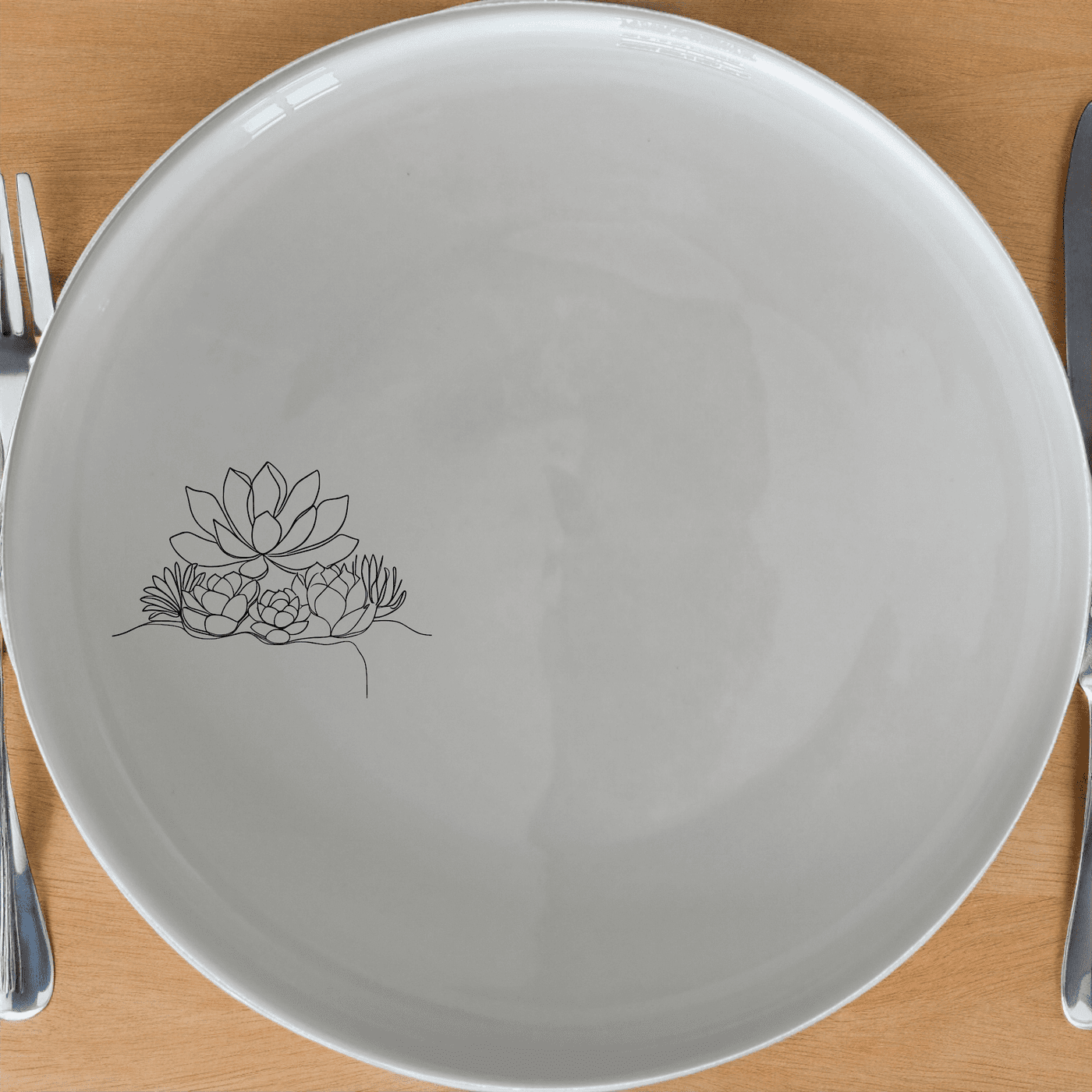 The Succulent Garden Side Plate Set of 4 features a minimalist design with a delicate succulent illustration, perfect for modern dining.