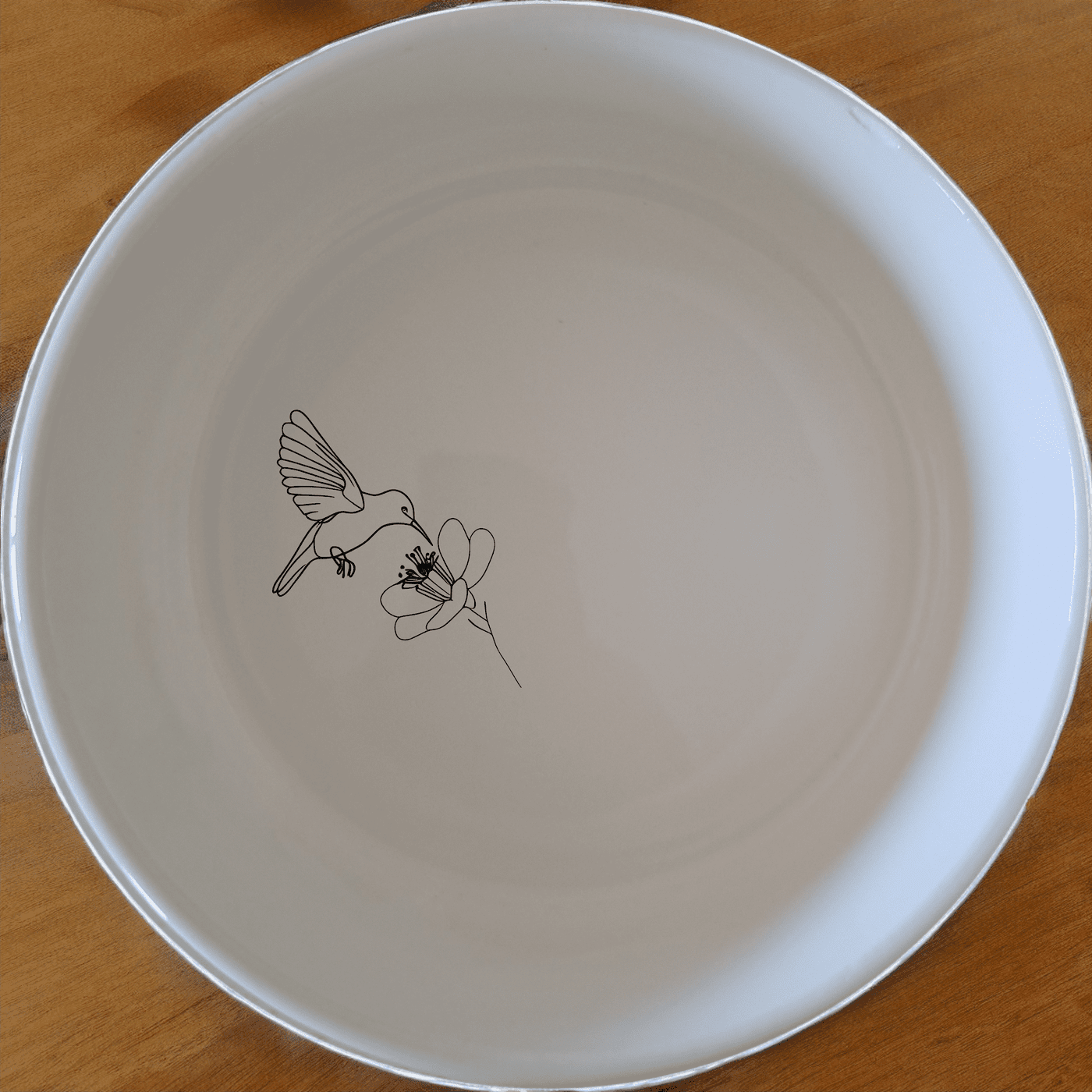 The Sunbird Flower Bloom Bowl Set of 4 features delicate laser-etched designs perfect for everyday use or special occasions.