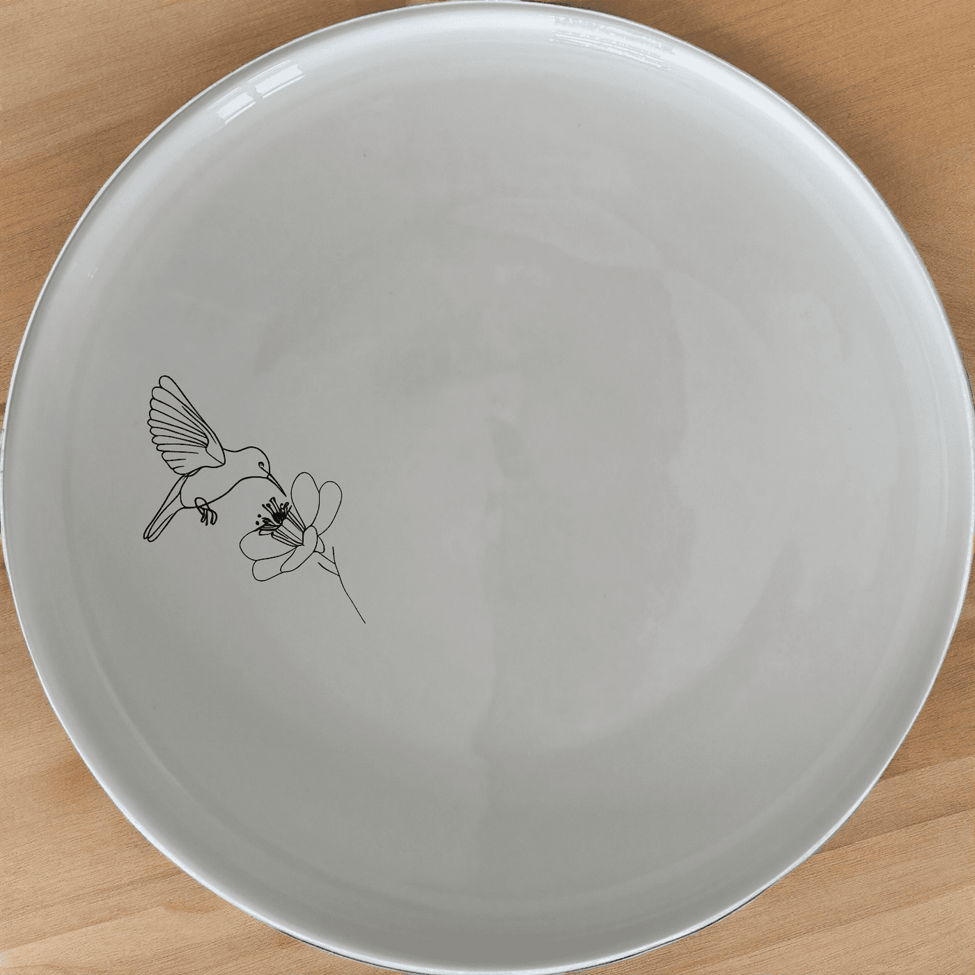 Discover the Sunbird Flower Bloom Dinner Plate Set of 4, a captivating collection that brings nature to your dining table with elegant sunbird and flower designs.