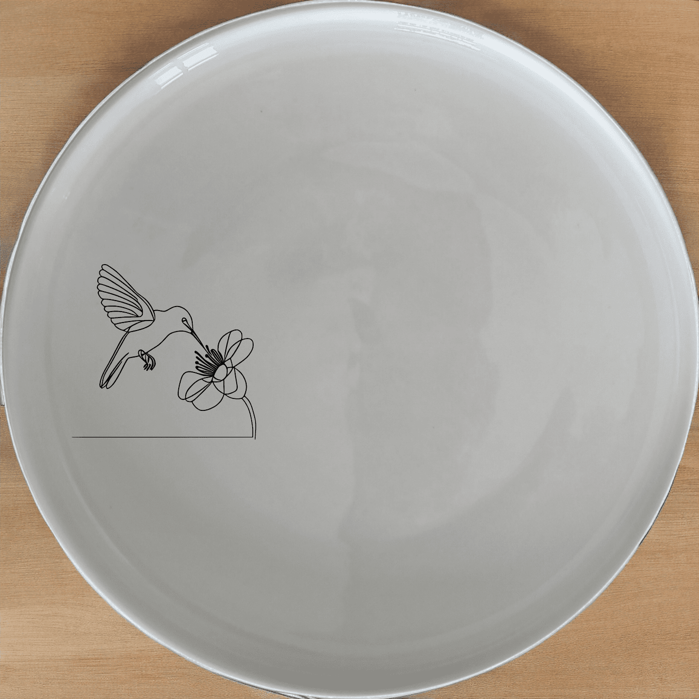 The Sunbird Flower Bloom Side Plate Set of 4 features delicate laser-etched designs perfect for everyday elegance and special occasions.