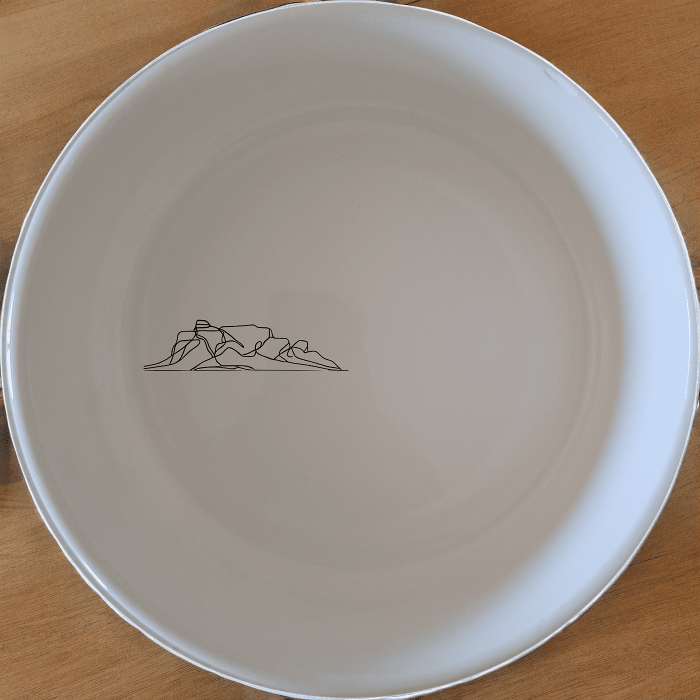 Discover the Table Mountain Bowl Set of 4, a stunning collection of ceramic bowls featuring a minimalist mountain silhouette design. Perfect for everyday use or special occasions.