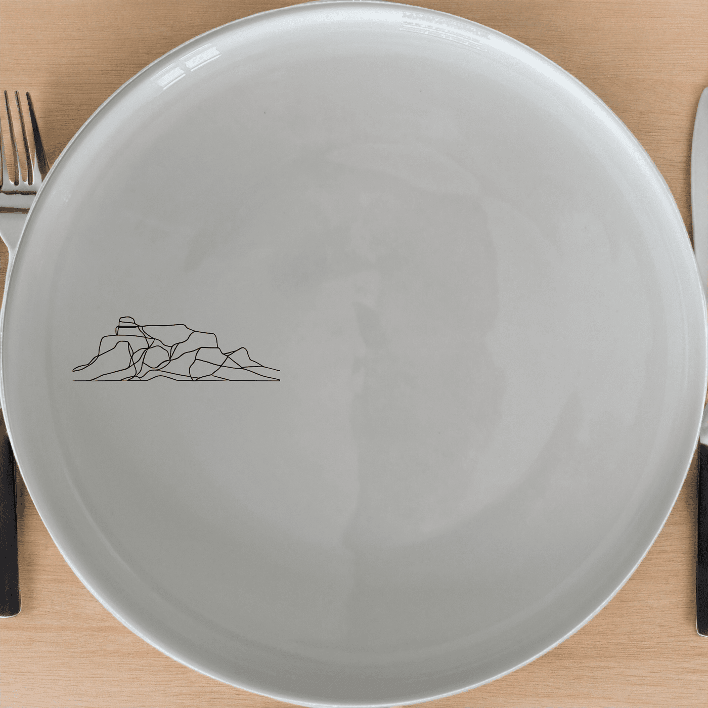 Table Mountain Side Plate Set of 4 is a stunning collection of four 21cm white ceramic plates featuring a laser-etched mountain silhouette design. Perfect for everyday use or special occasions.