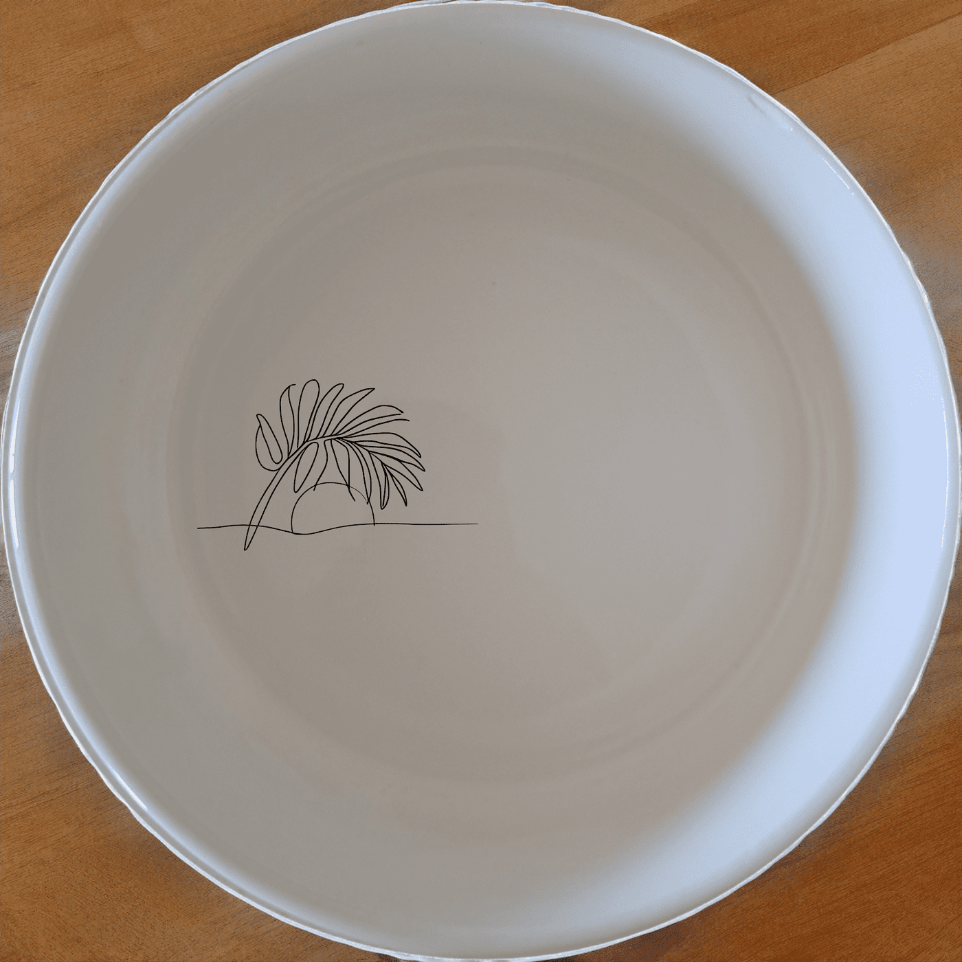 The Tropical Palm Fronds Sunset Bowl Set of 4 adds a touch of nature to your dining experience with its elegant design.