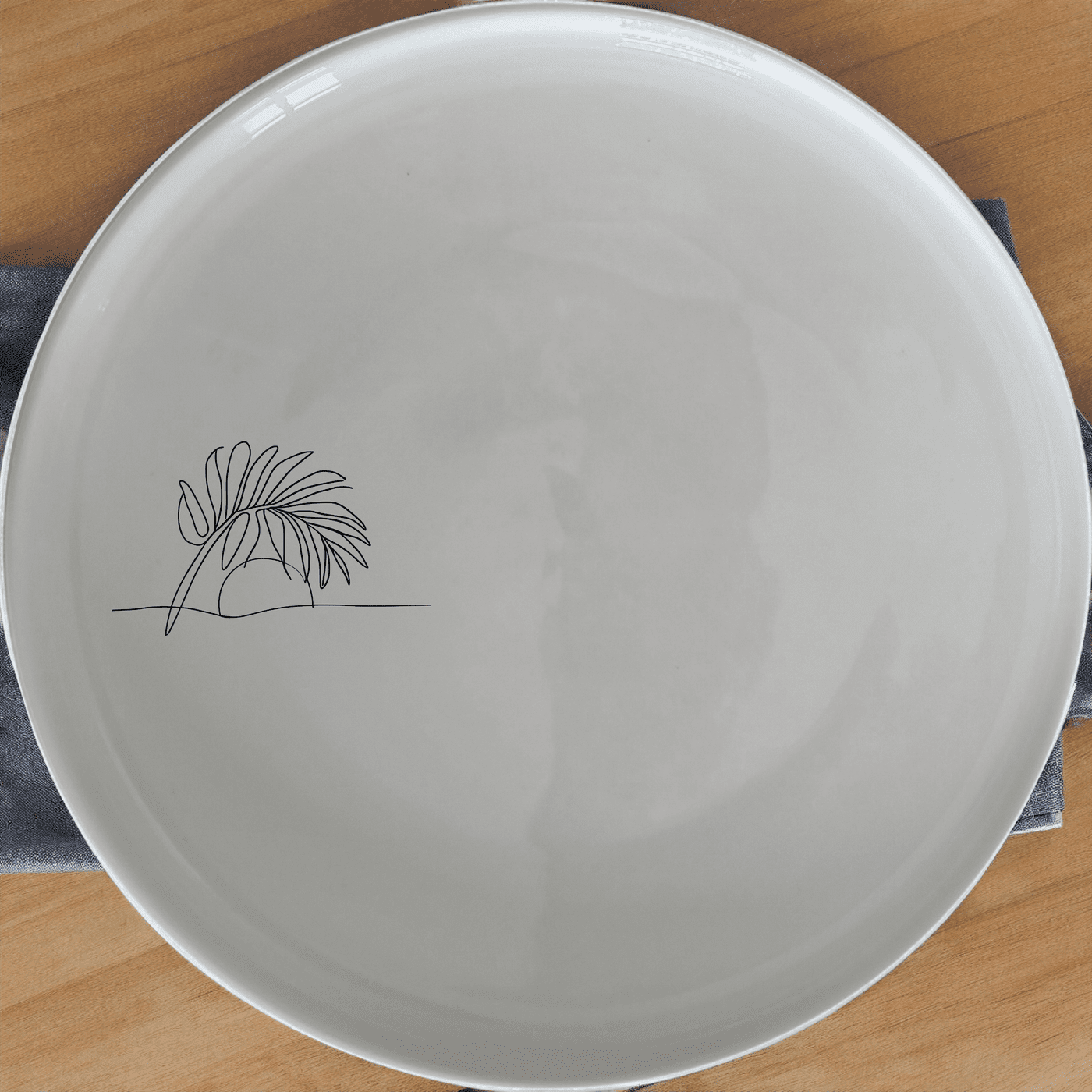 Tropical Palm Fronds Dinner Plate Set of 4 adds a serene beach vibe to your dining table with minimalist palm frond designs.