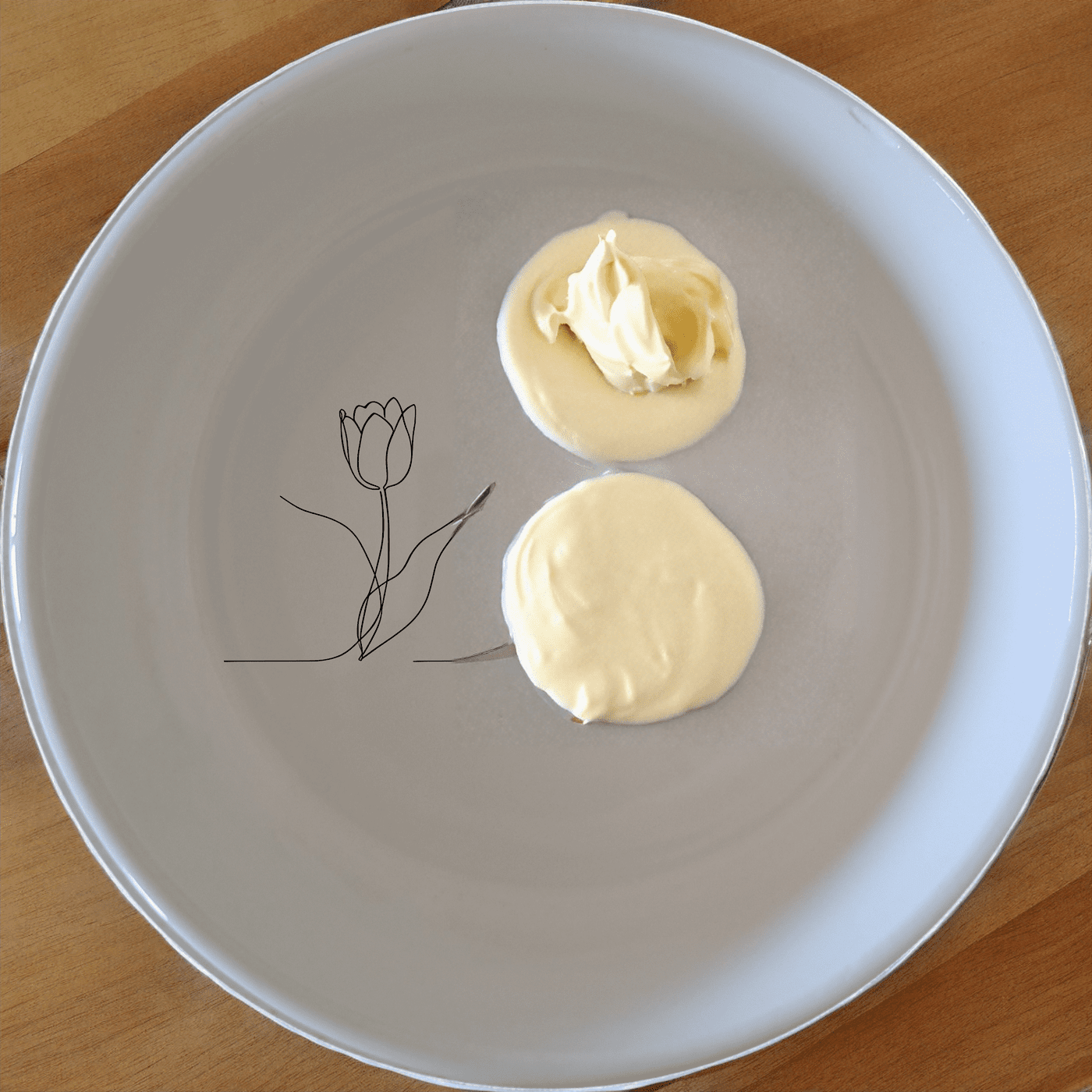 The Tulips Bowl Set of 4 features a minimalist design with a subtle tulip illustration, perfect for everyday use and special occasions.