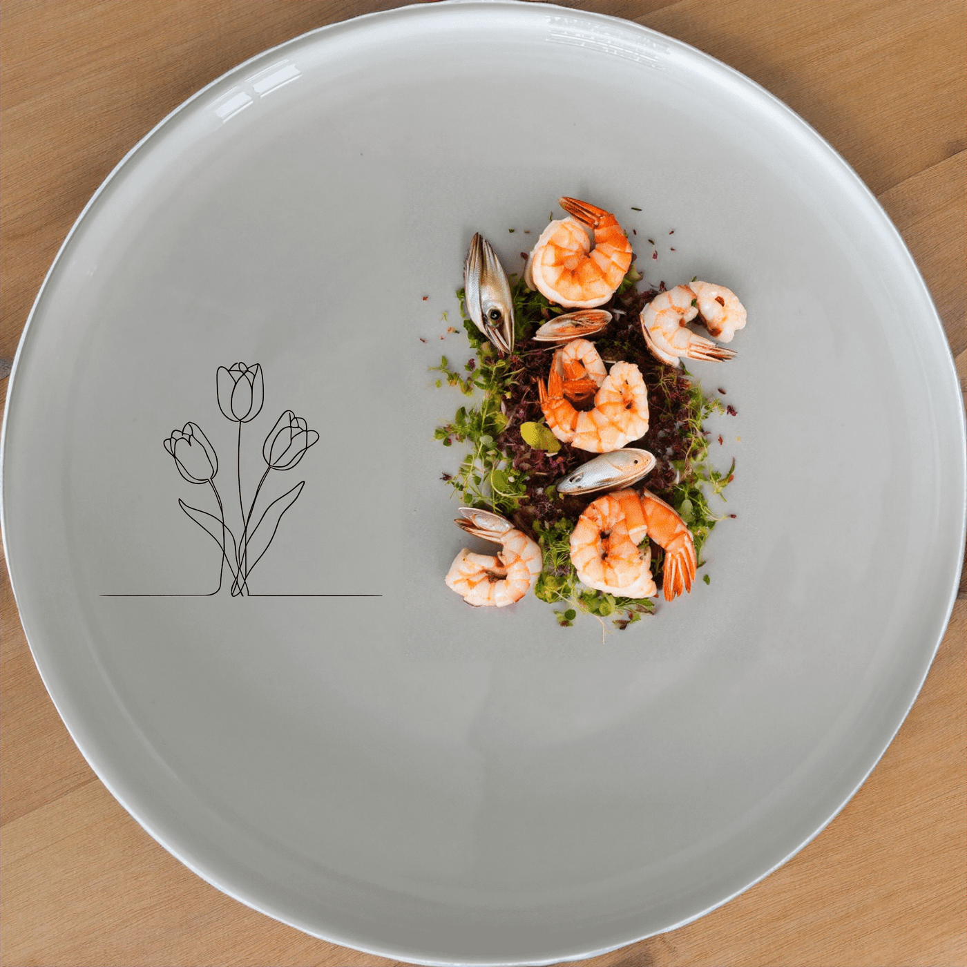 The Tulips Dinner Plate Set of 4 features a minimalist design with elegant tulip illustrations, perfect for any dining occasion.