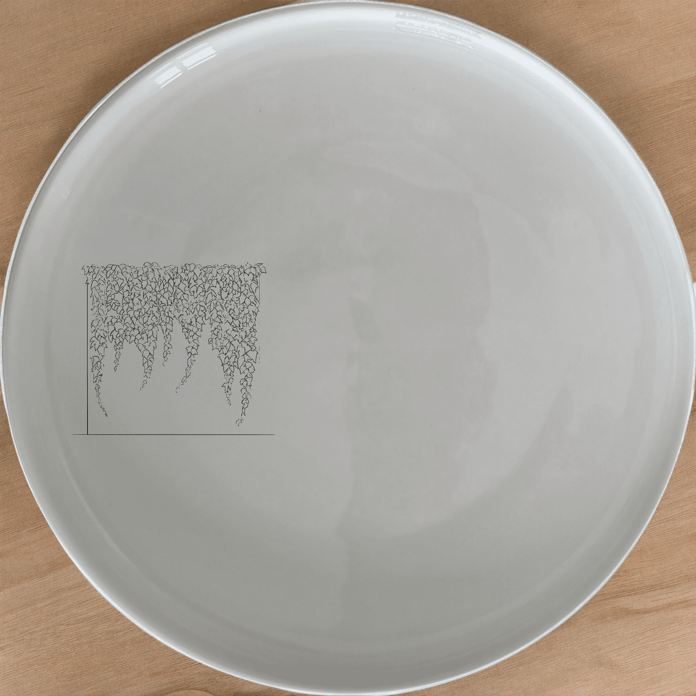 The Verdant Green Ivy Climbing Wall Side Plate Set of 4 features a unique design that brings nature to your table, perfect for any dining occasion.