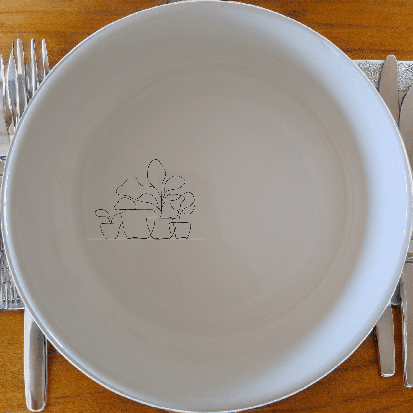 The Warm Terracotta Pots Leafy Plants Bowl Set of 4 adds a touch of nature to your dining experience with its elegant design and versatile use.