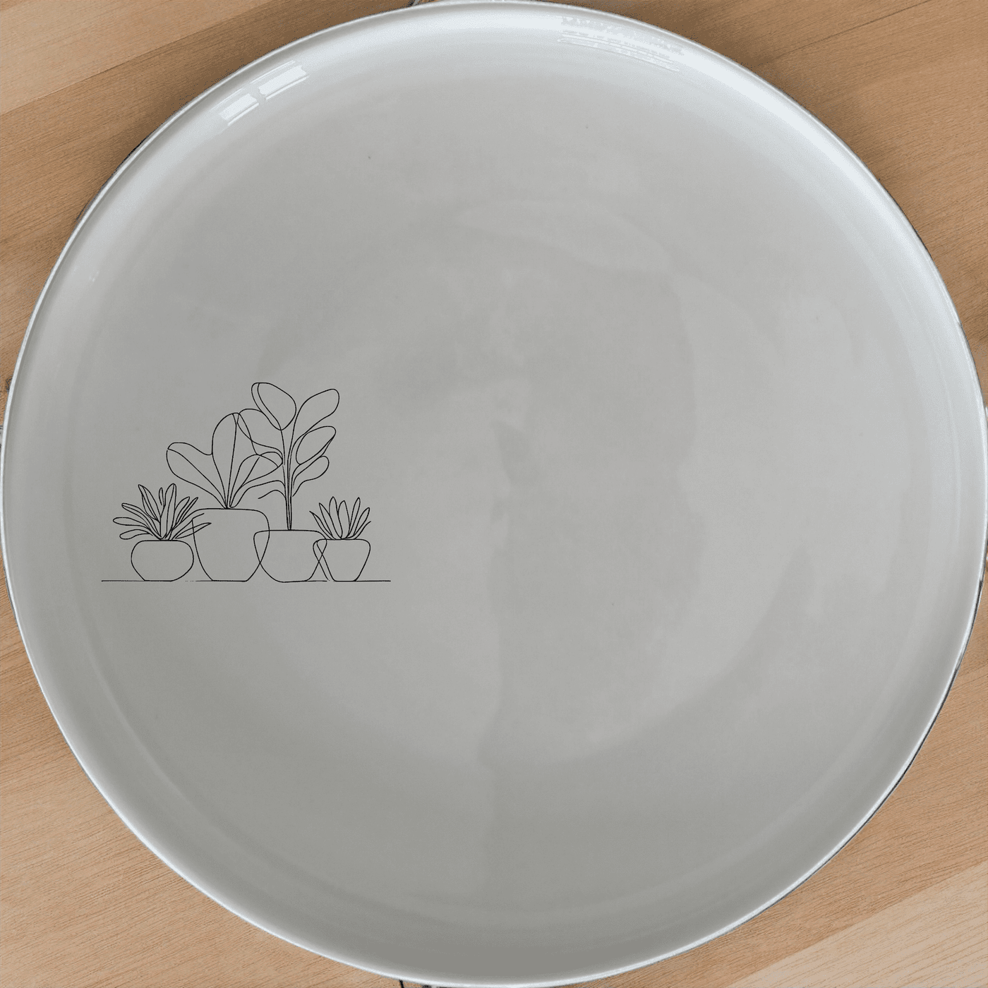 The Warm Terracotta Pots Leafy Plants Dinner Plate Set of 4 features minimalist plant illustrations, perfect for modern dining and everyday use.