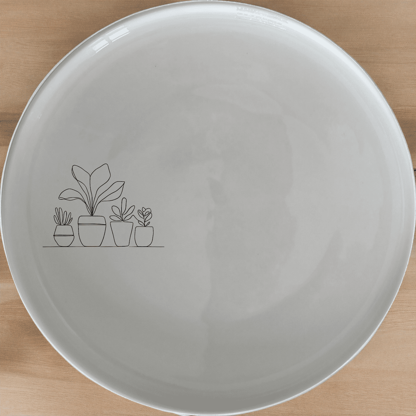 The Warm Terracotta Pots Leafy Plants Dinner Plate Set of 4 adds a touch of nature to your dining experience with its elegant design.