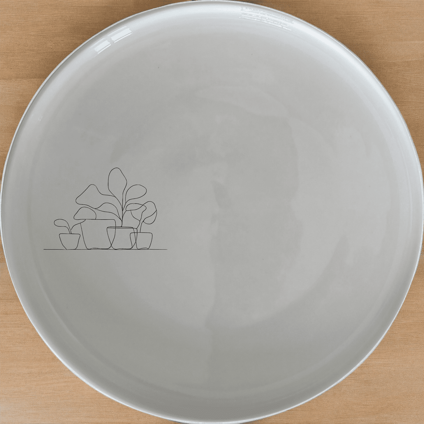 The Warm Terracotta Pots Leafy Plants Dinner Plate Set of 4 adds a touch of nature to your dining table with its elegant design.