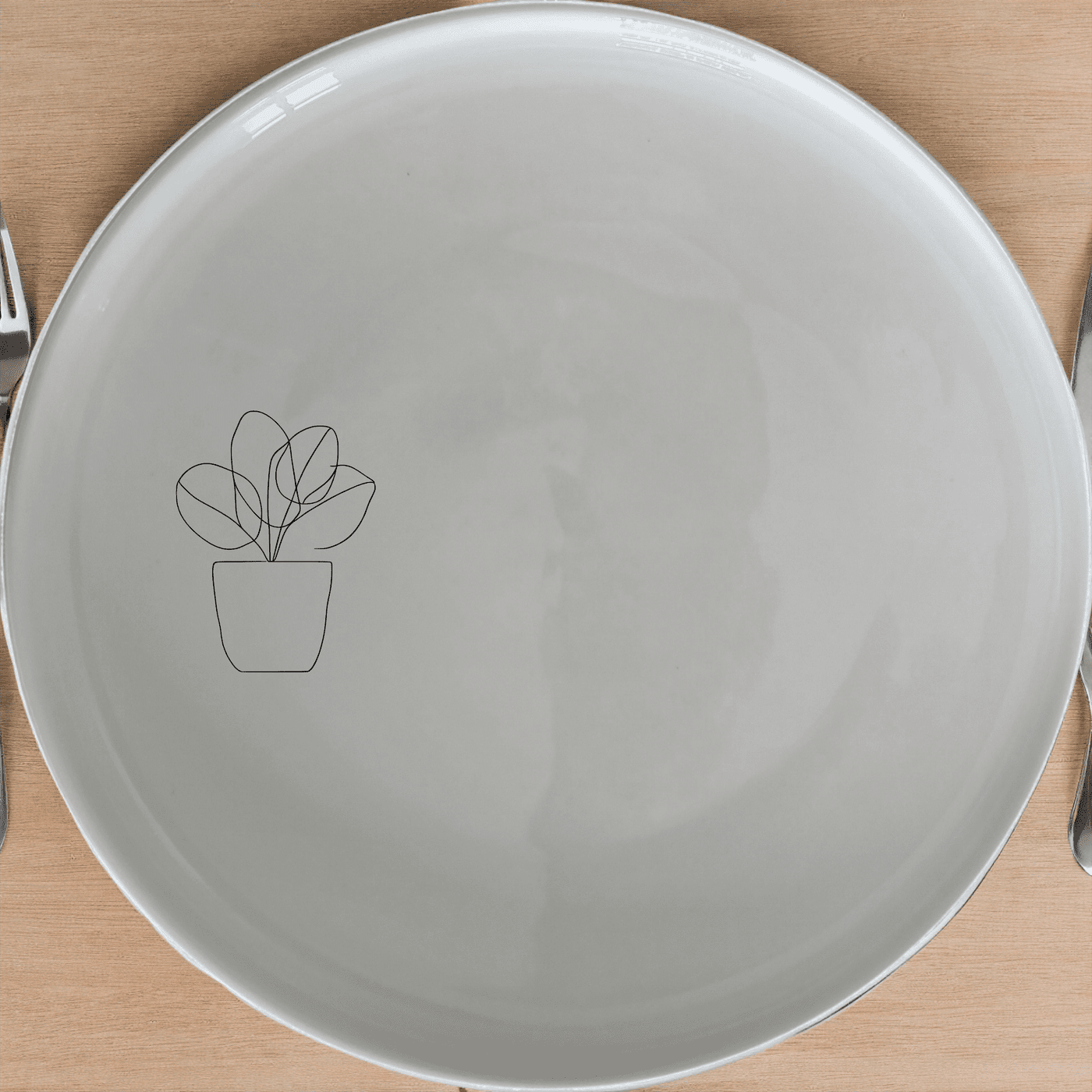 The Warm Terracotta Pots Leafy Plants Side Plate Set of 4 features a modern, minimalist design perfect for any dining table. Crafted from high-quality ceramic, these plates are both stylish and durable, ideal for everyday use or special occasions.