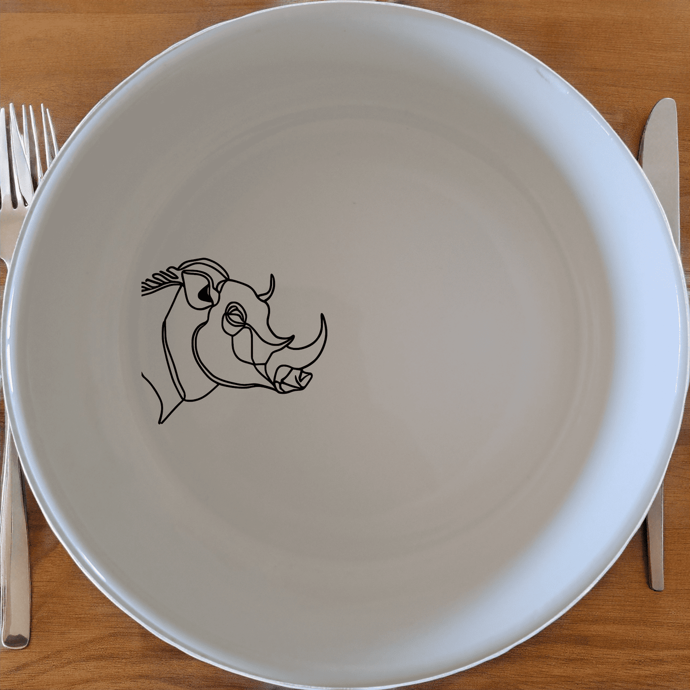 The Warthog Profile Side View Bowl Set of 4 features a unique and stylish design perfect for any dining table. Crafted from high-quality ceramic, these bowls are both durable and elegant, making them ideal for everyday use or special occasions.