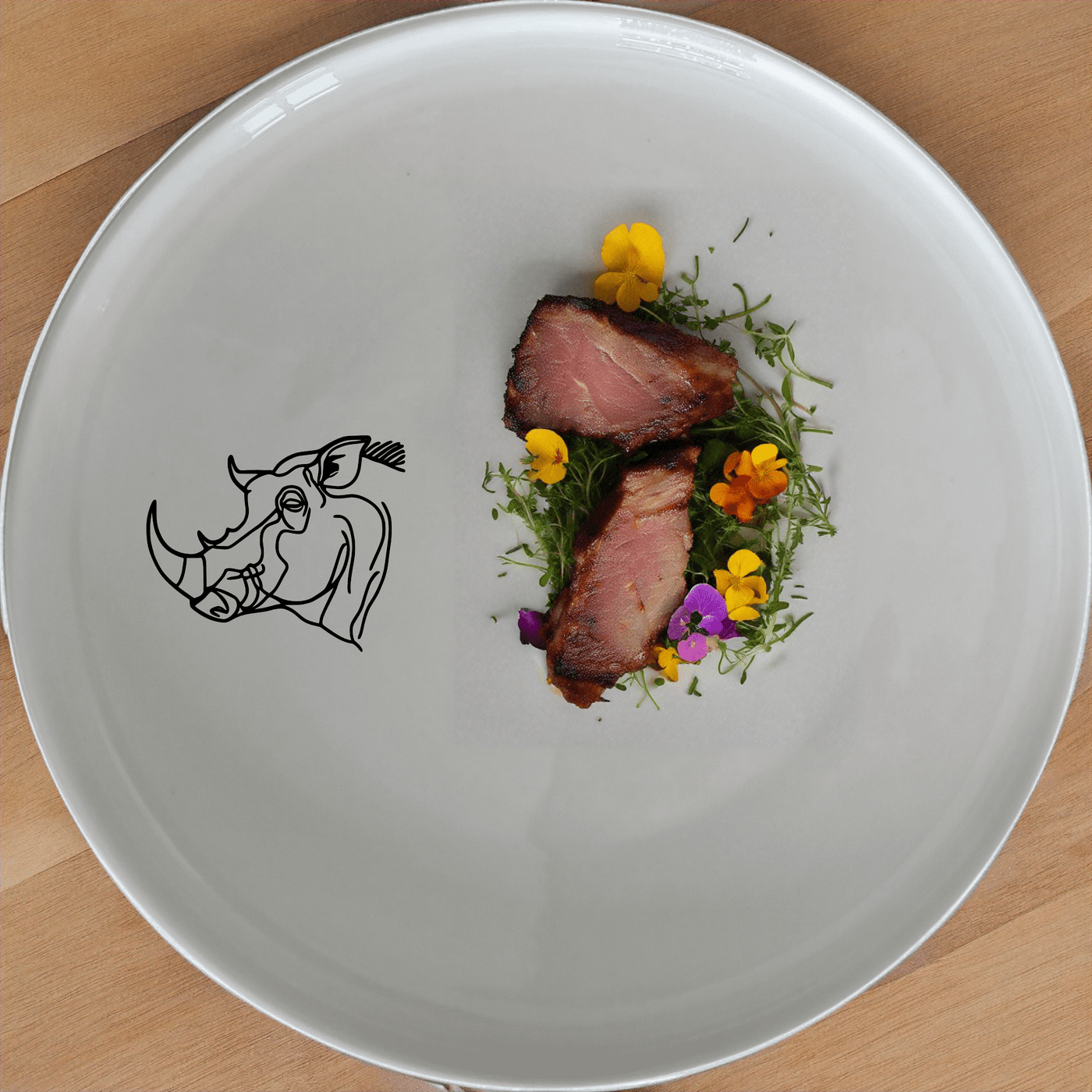 The Warthog Profile Side Plate Set of 4 features a sleek, minimalist design perfect for modern dining. Crafted from durable ceramic, these plates are both dishwasher and microwave safe.