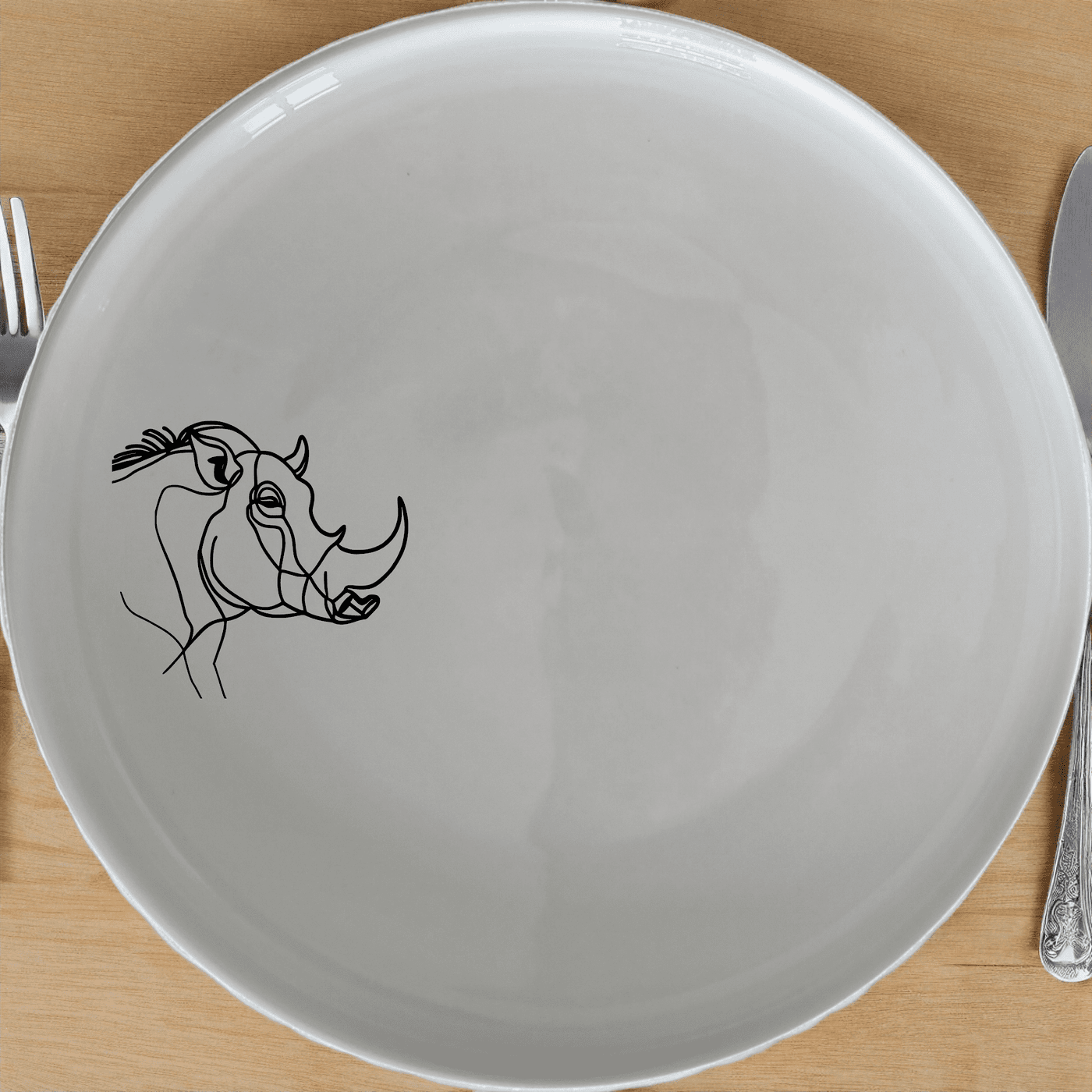 The Warthog Portrait Side Plate Set of 4 adds a touch of nature to your dining table with its elegant design.