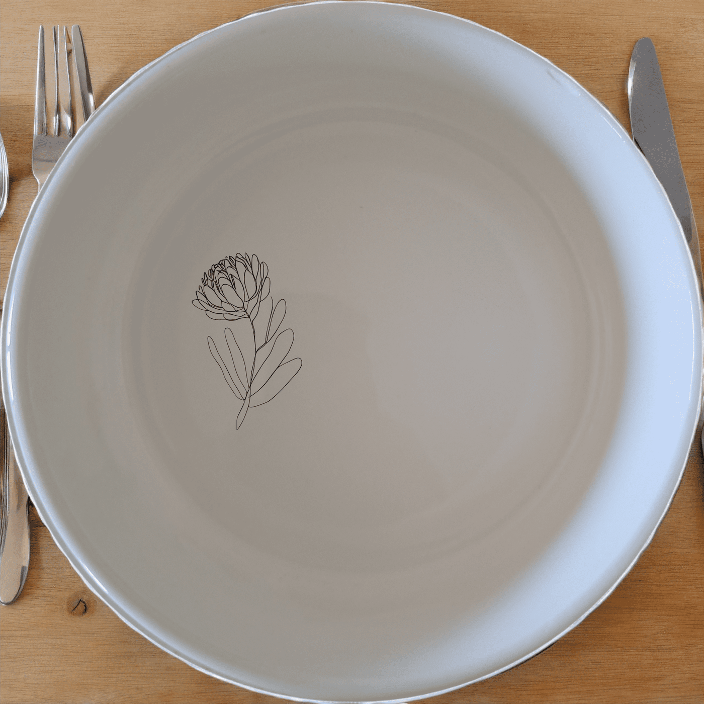 The Western Cape Fynbos Bowl Set of 4 features delicate botanical designs, perfect for everyday use or special occasions.