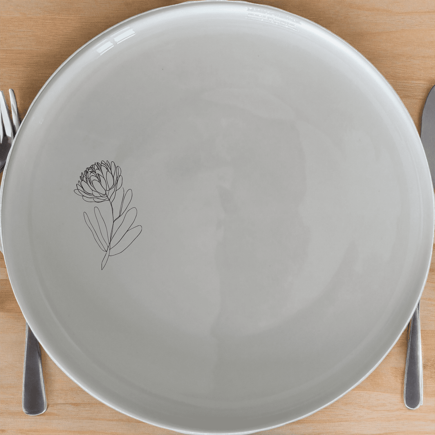 Discover the Western Cape Fynbos Dinner Plate Set of 4, a stunning collection of ceramic plates featuring delicate botanical designs.