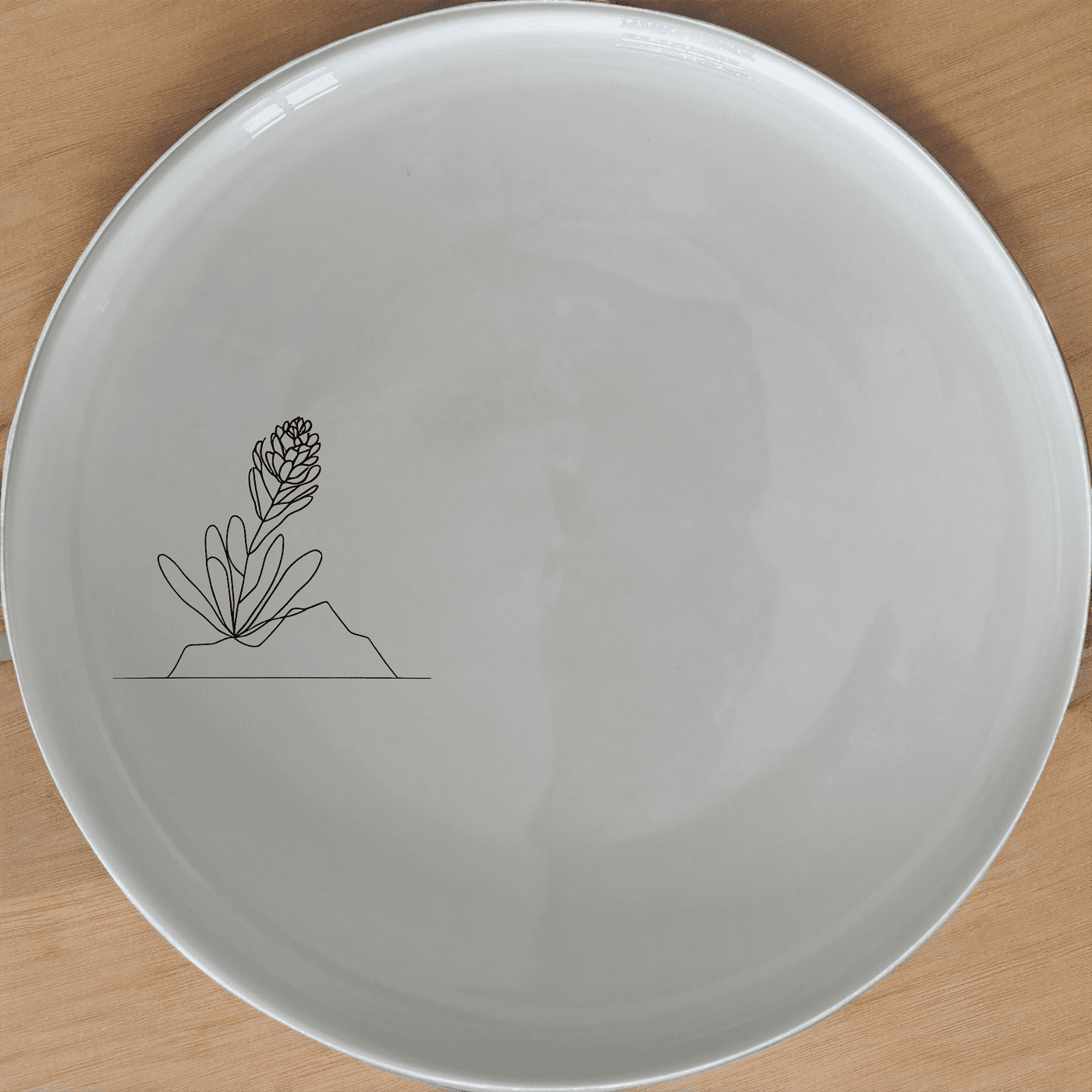 The Western Cape Fynbos Side Plate Set of 4 features delicate botanical illustrations, perfect for adding a touch of nature to your dining experience.