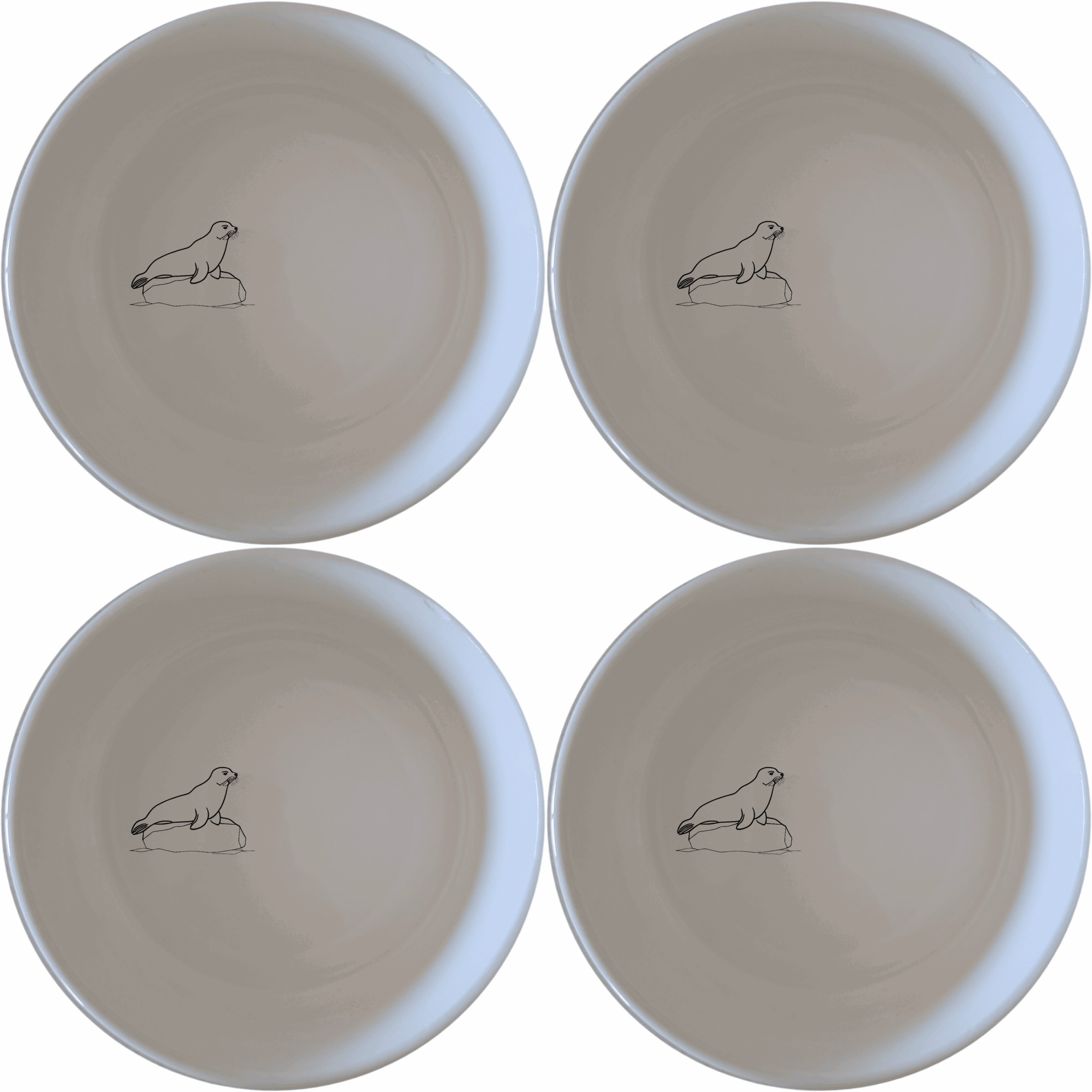 The Harbor Seal Bowl Set of 4 - Range 3 features a charming harbor seal design on each bowl, perfect for adding a touch of nature to your dining experience.