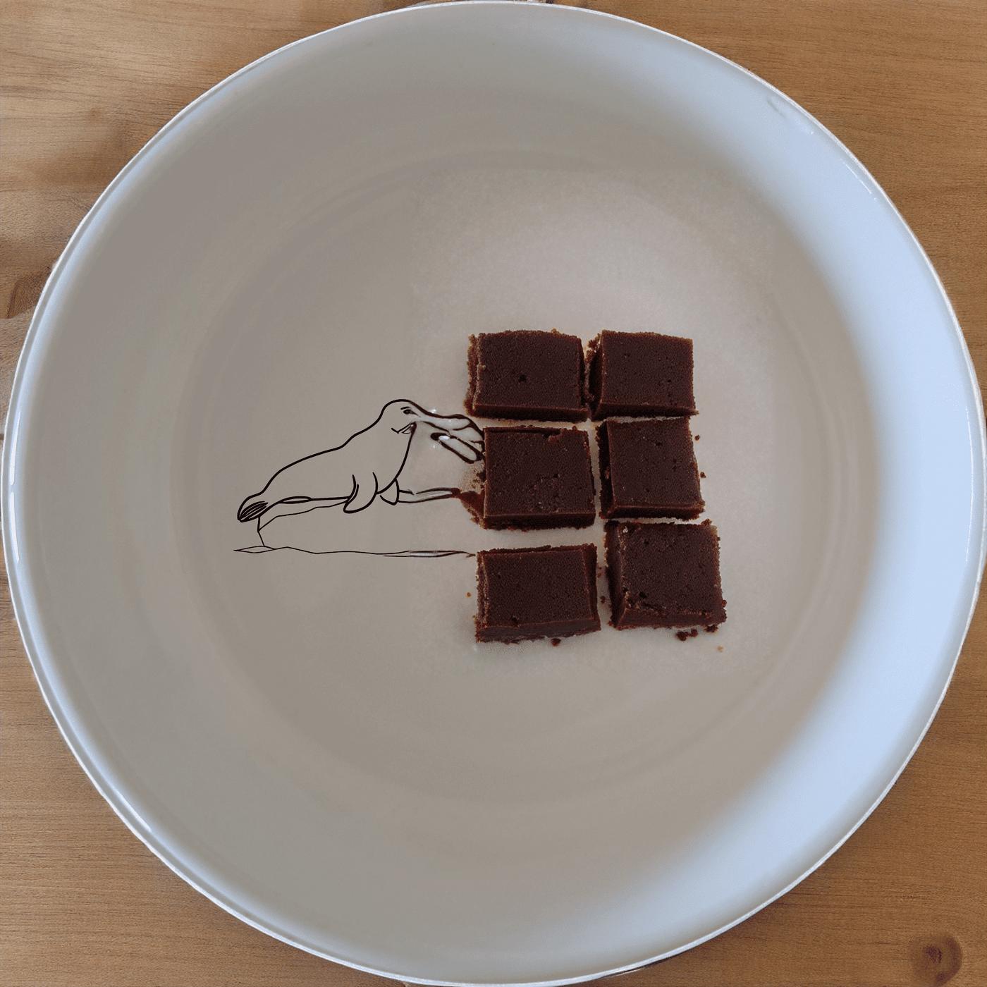 The Harbor Seal Bowl Set of 4 - Range 3 features a charming harbor seal design on each bowl, perfect for adding a touch of nature to your dining experience.